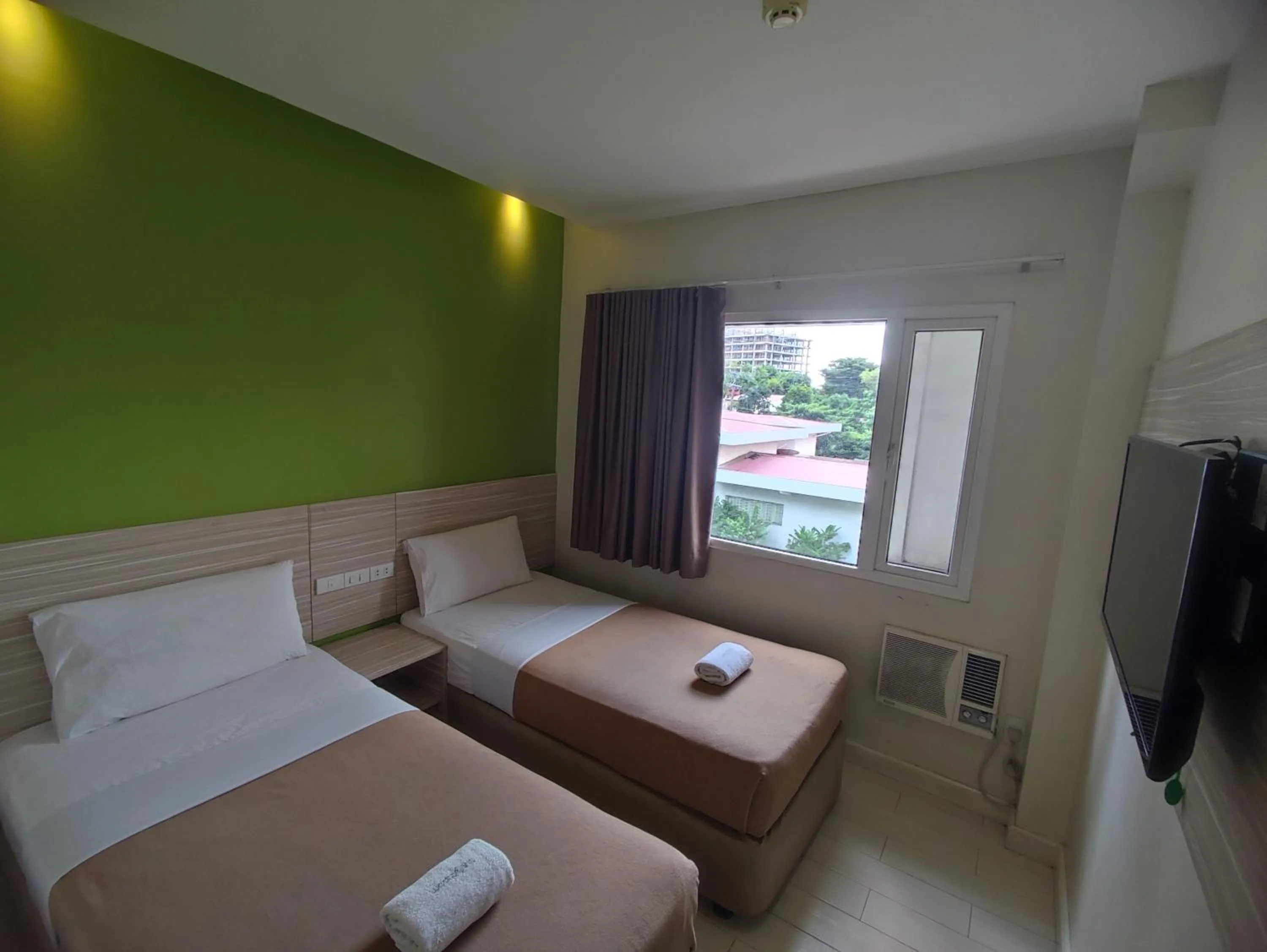 Bed in Westpoint Hotel