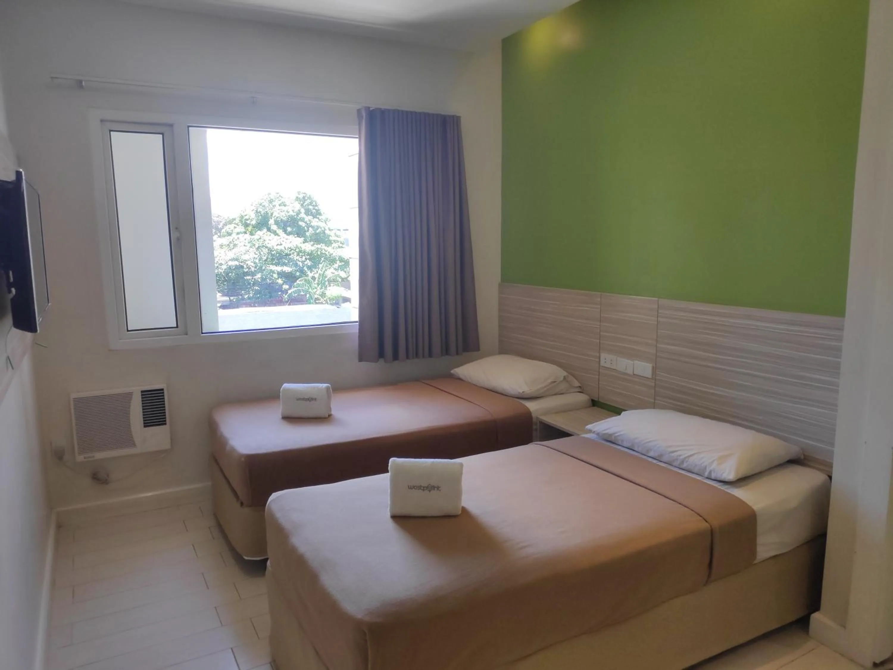 Bed in Westpoint Hotel