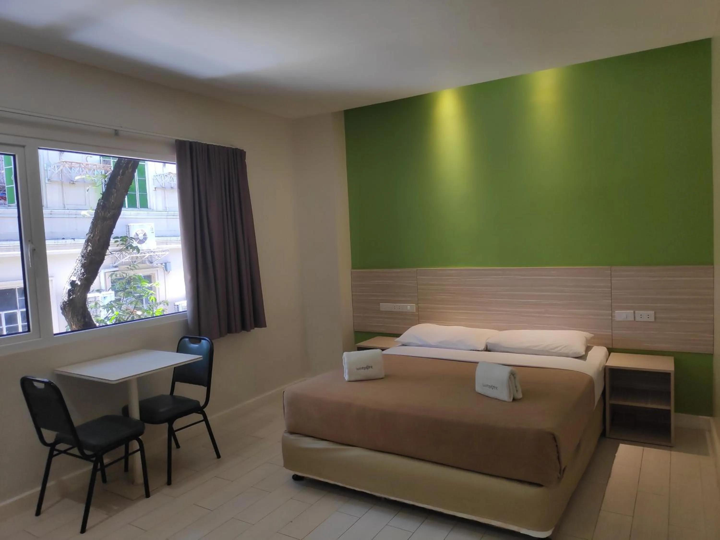 Bed in Westpoint Hotel