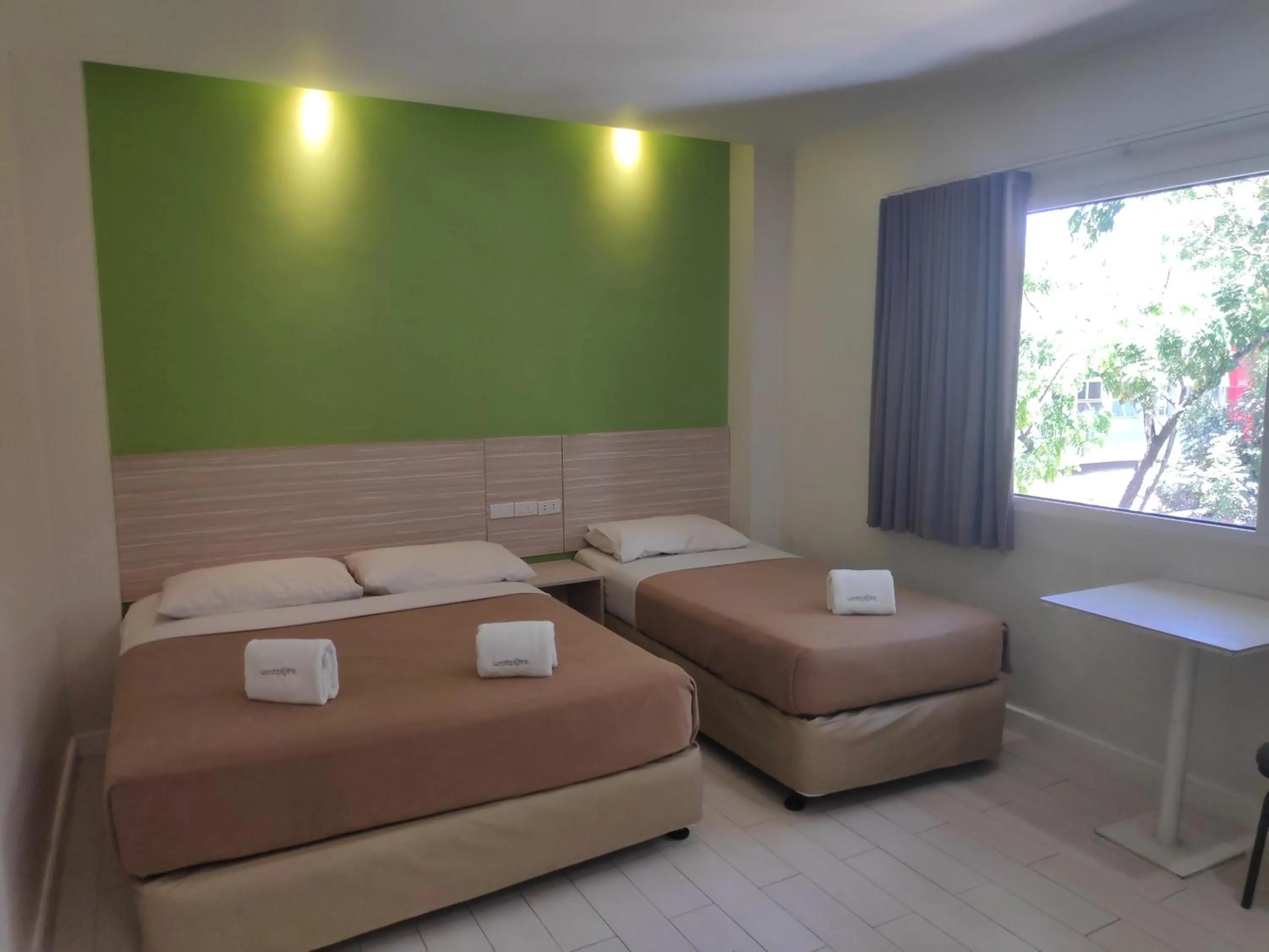 Bed in Westpoint Hotel