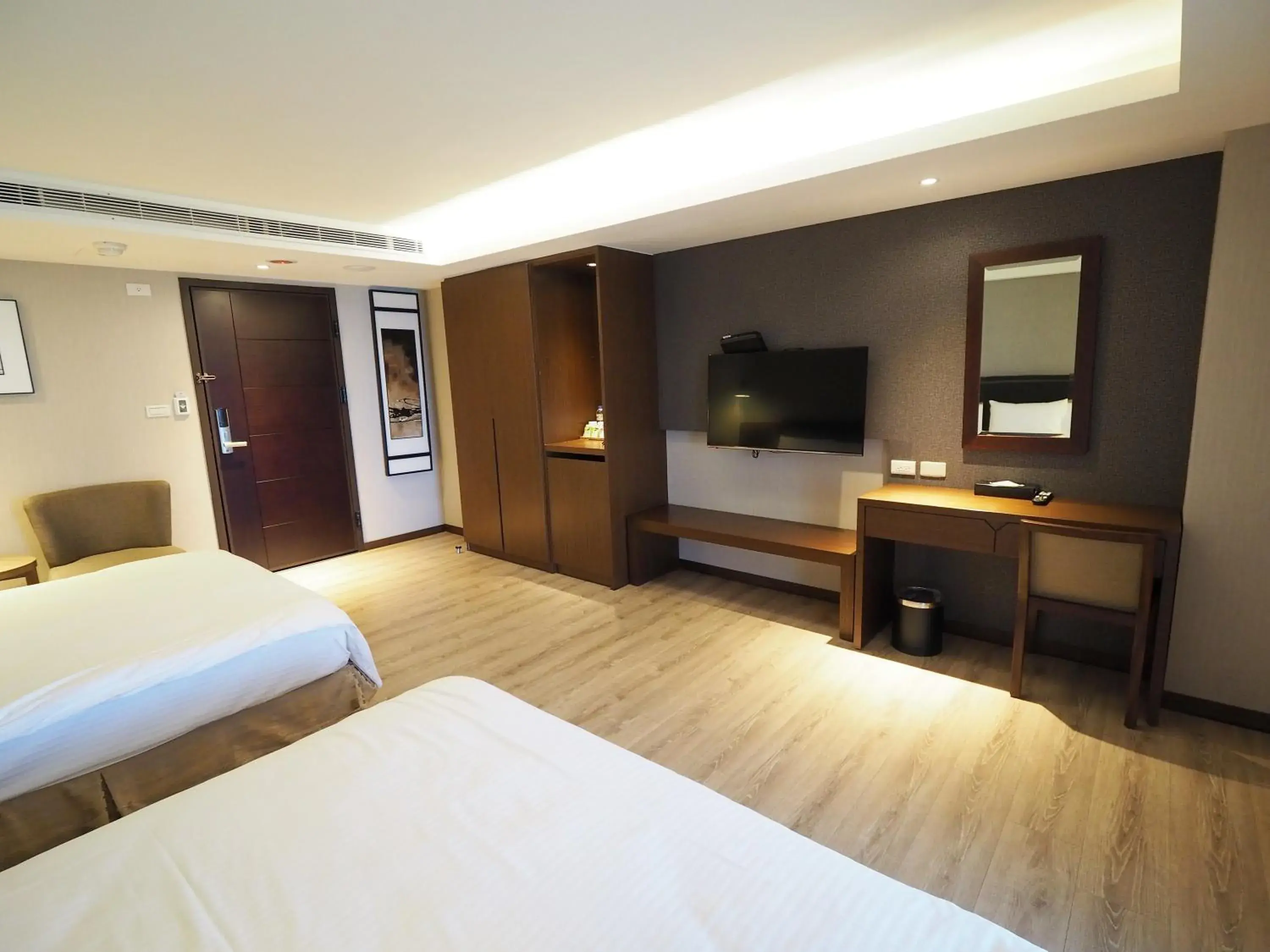 Bed, TV/Entertainment Center in Kailan Hotel