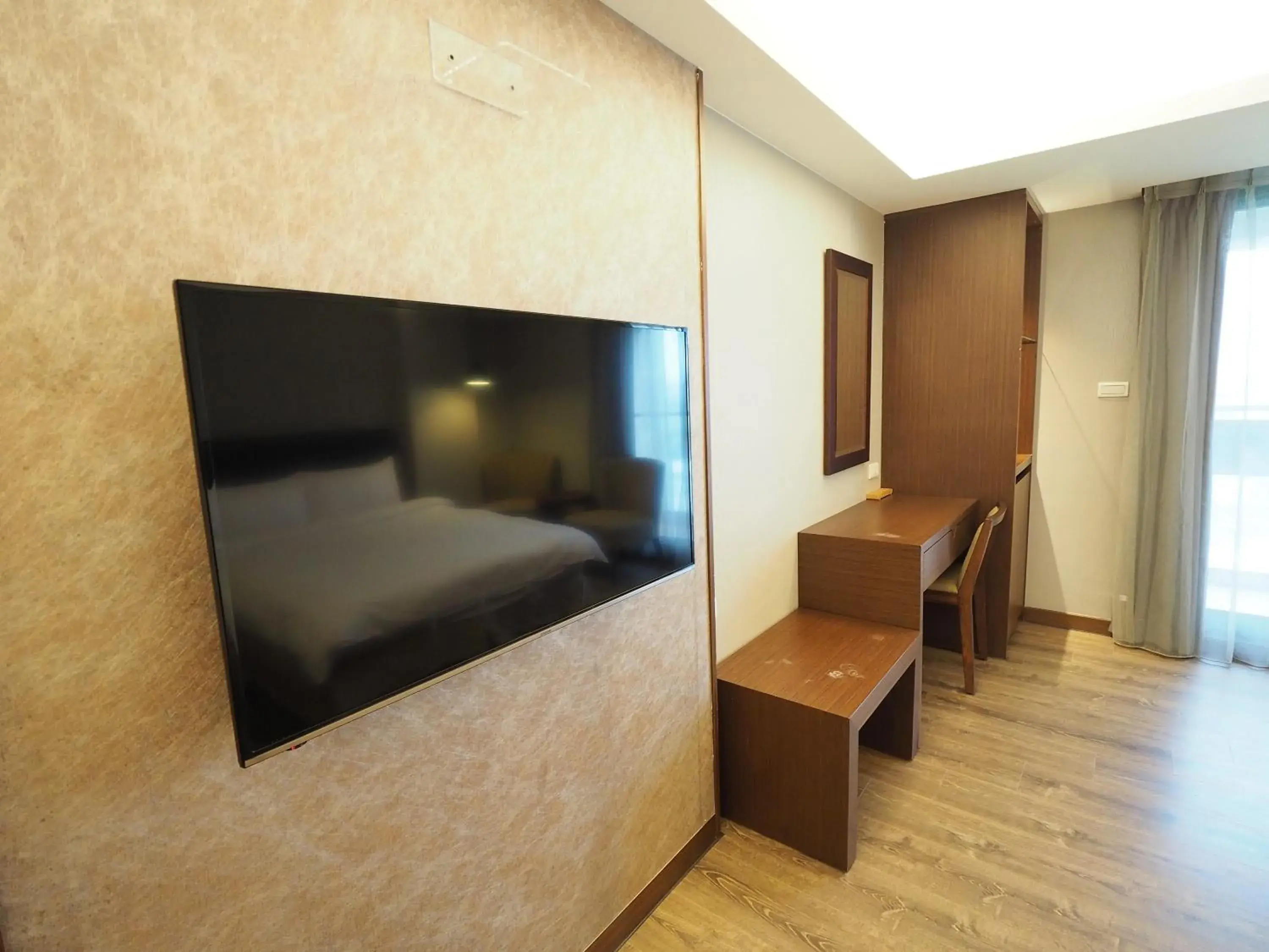 TV and multimedia, TV/Entertainment Center in Kailan Hotel