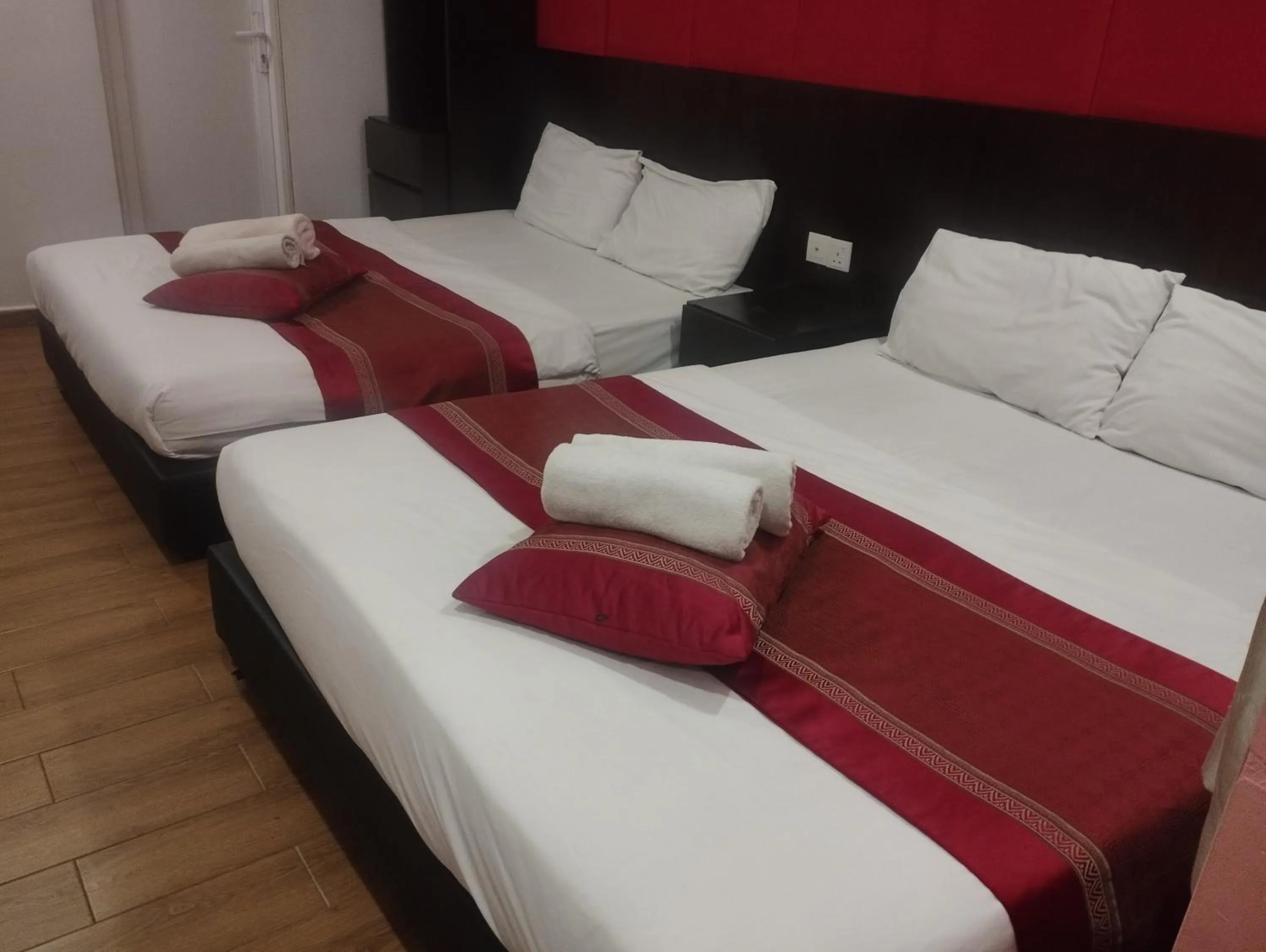 Bed in D'Spark Hotel Bayu