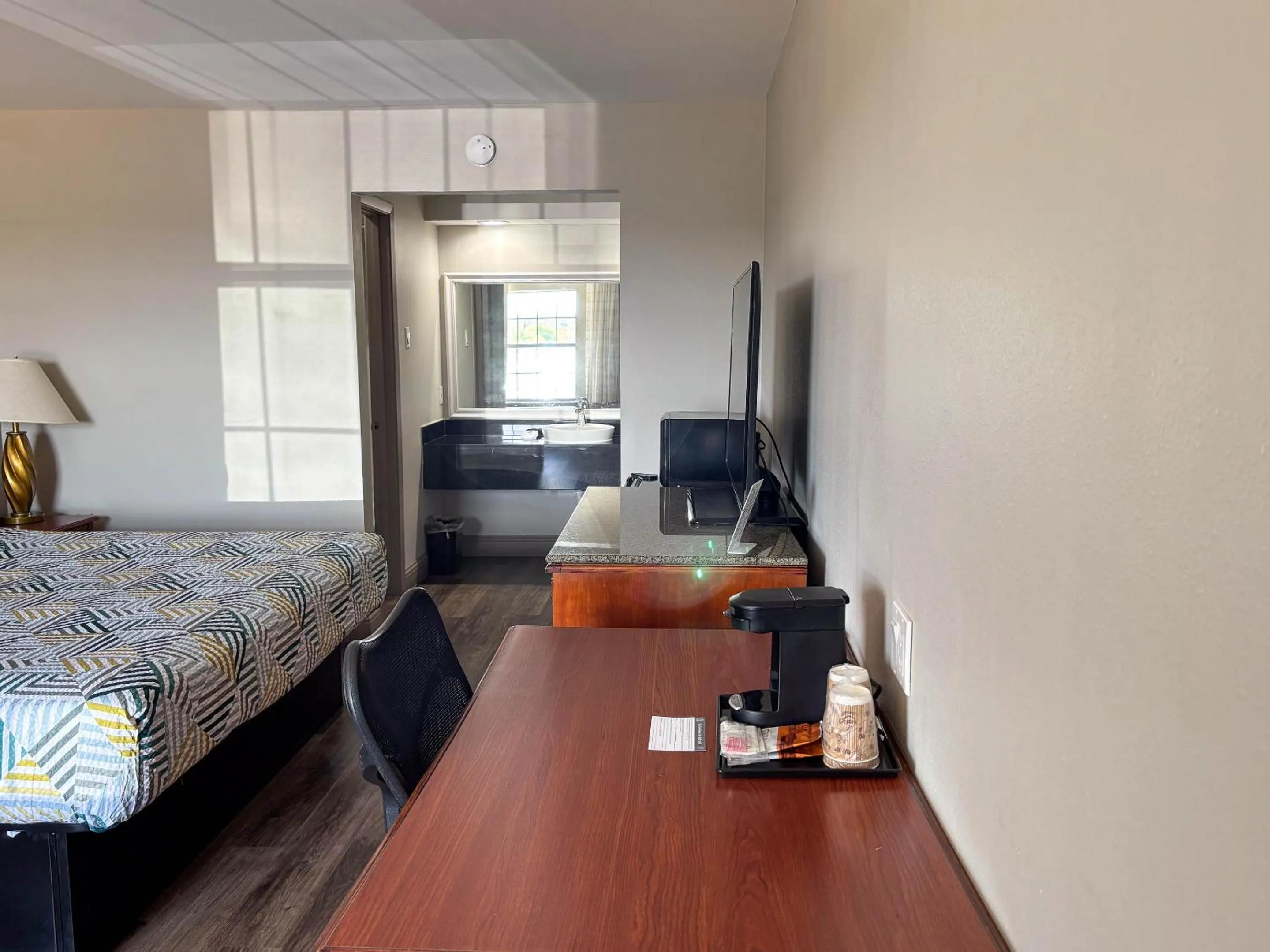 Bed in Studio 6 Suites Mesquite, TX – Gross Rd.
