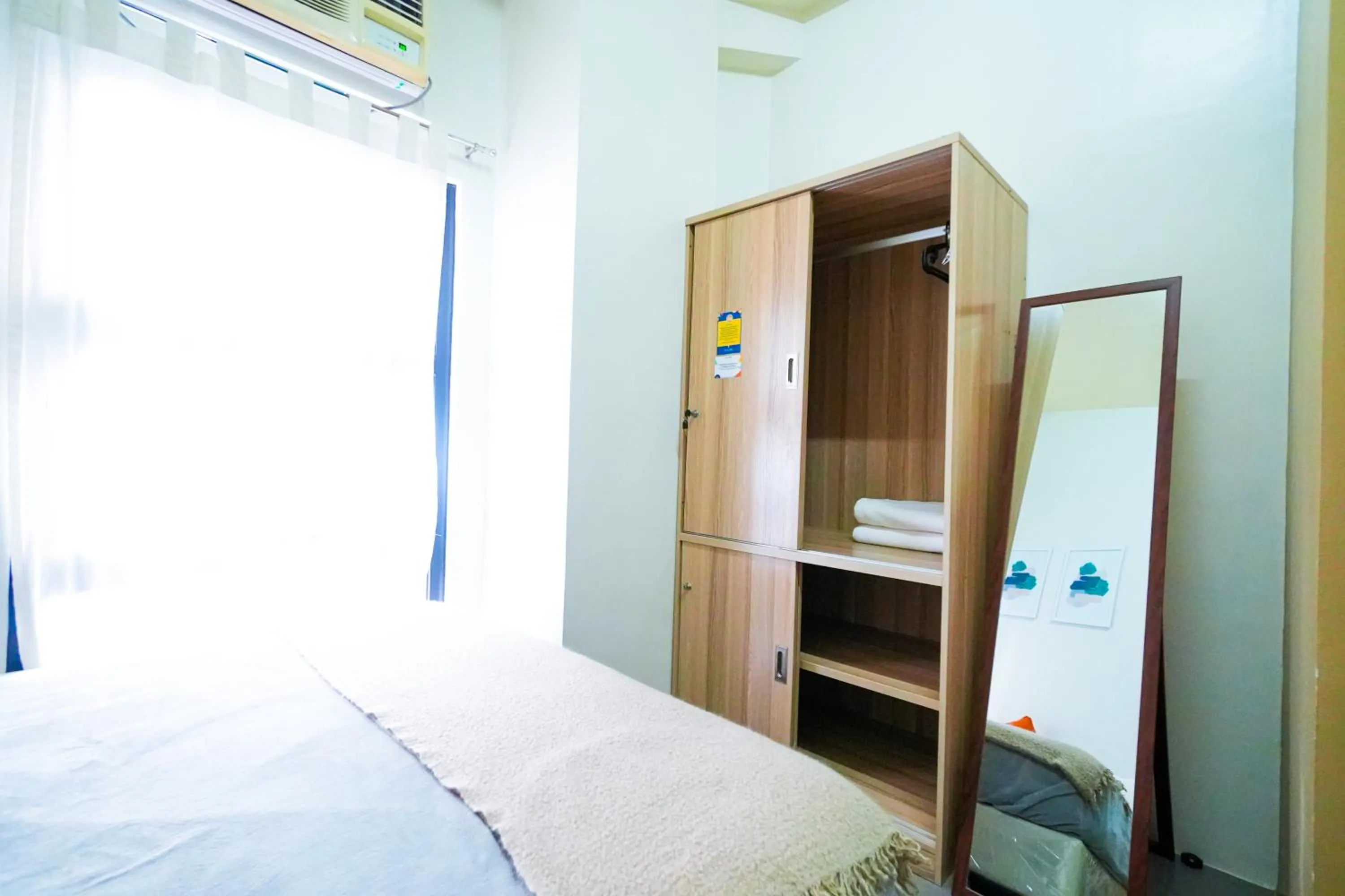 Bed in The City Flats Amorsolo