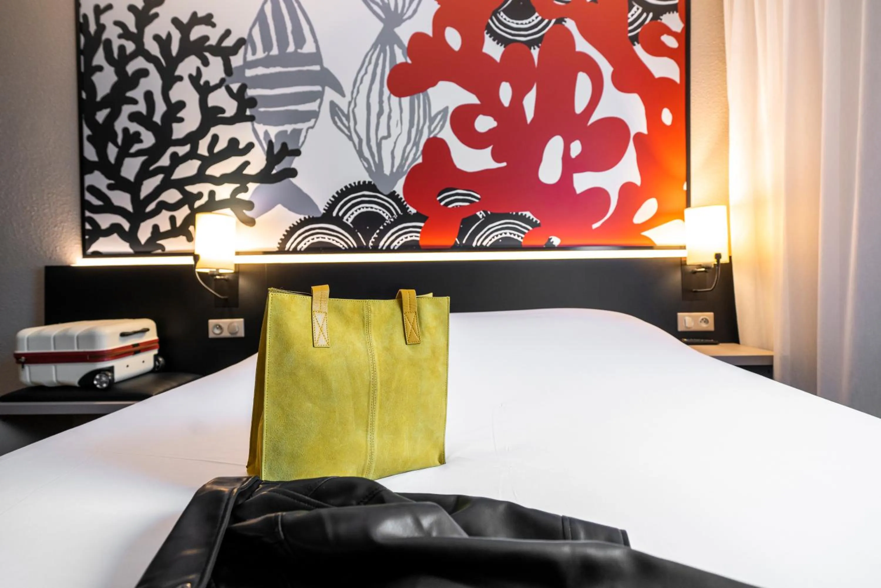 Decorative detail, Bed in ibis Styles Saint Brieuc Plerin