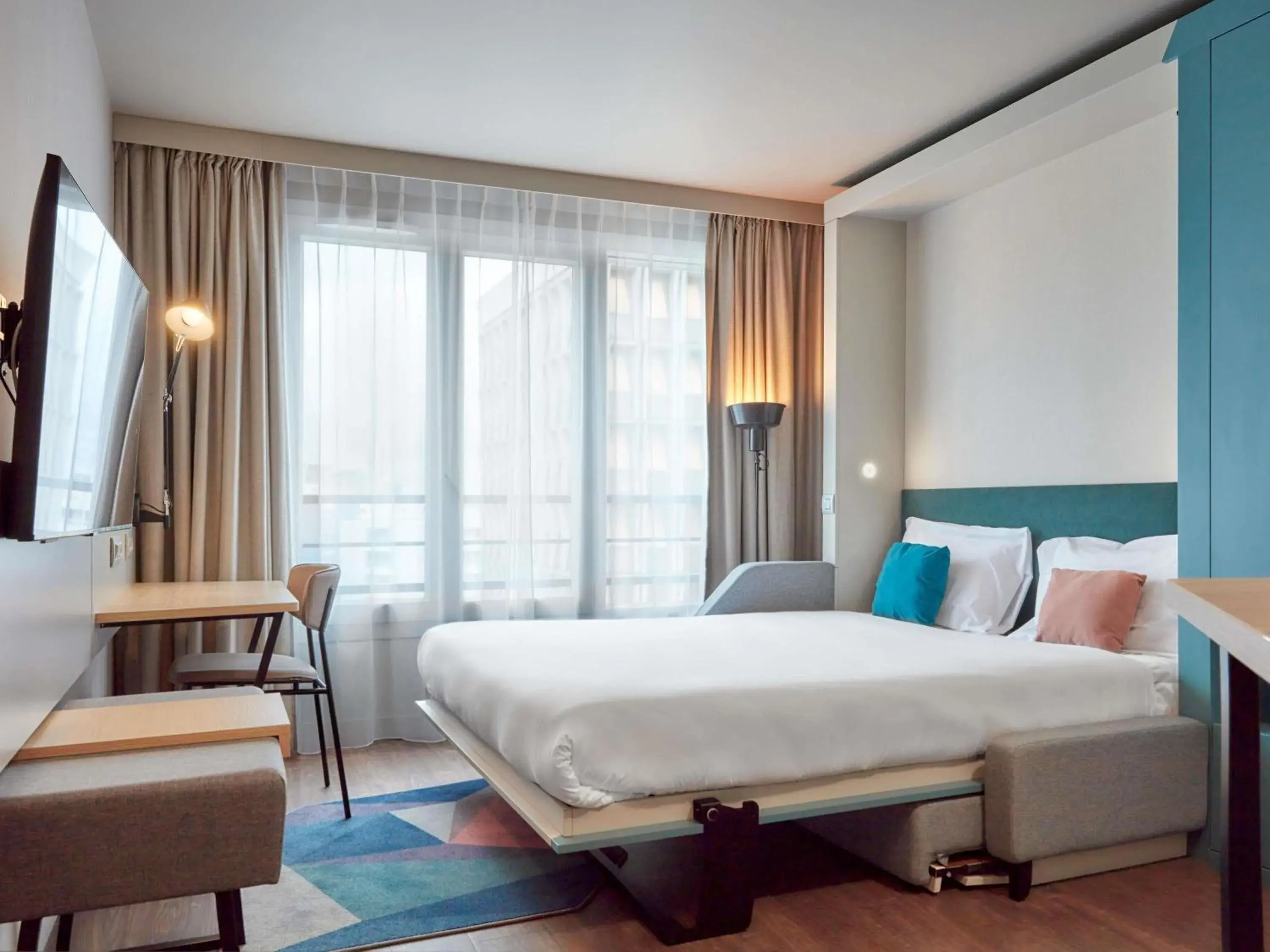 Bed in Aparthotel Adagio Paris Nation Bed in Aparthotel Adagio Paris Nation