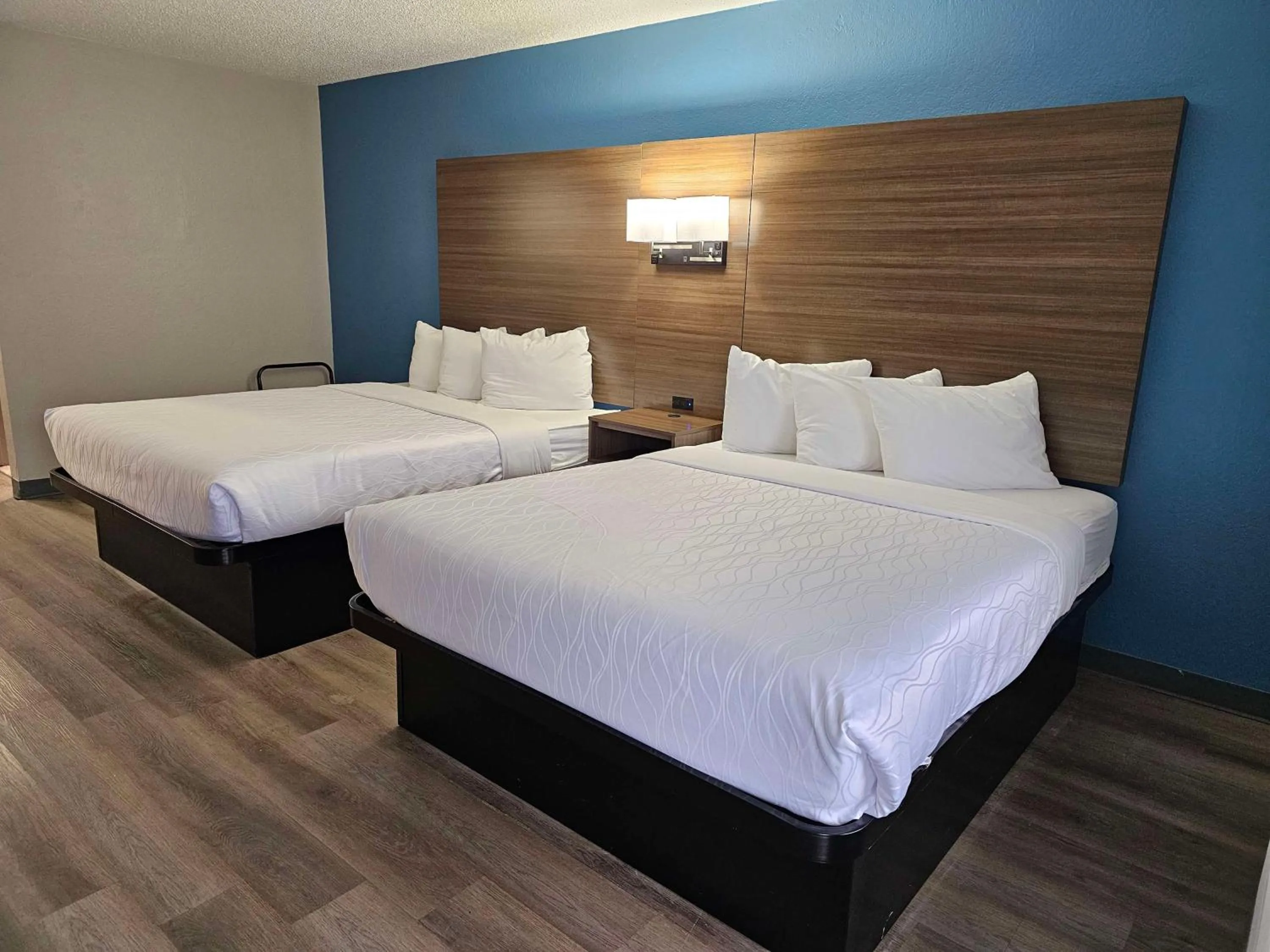 Queen Room with Two Queen Beds and Pool View - Non-Smoking in SureStay by Best Western Victoria