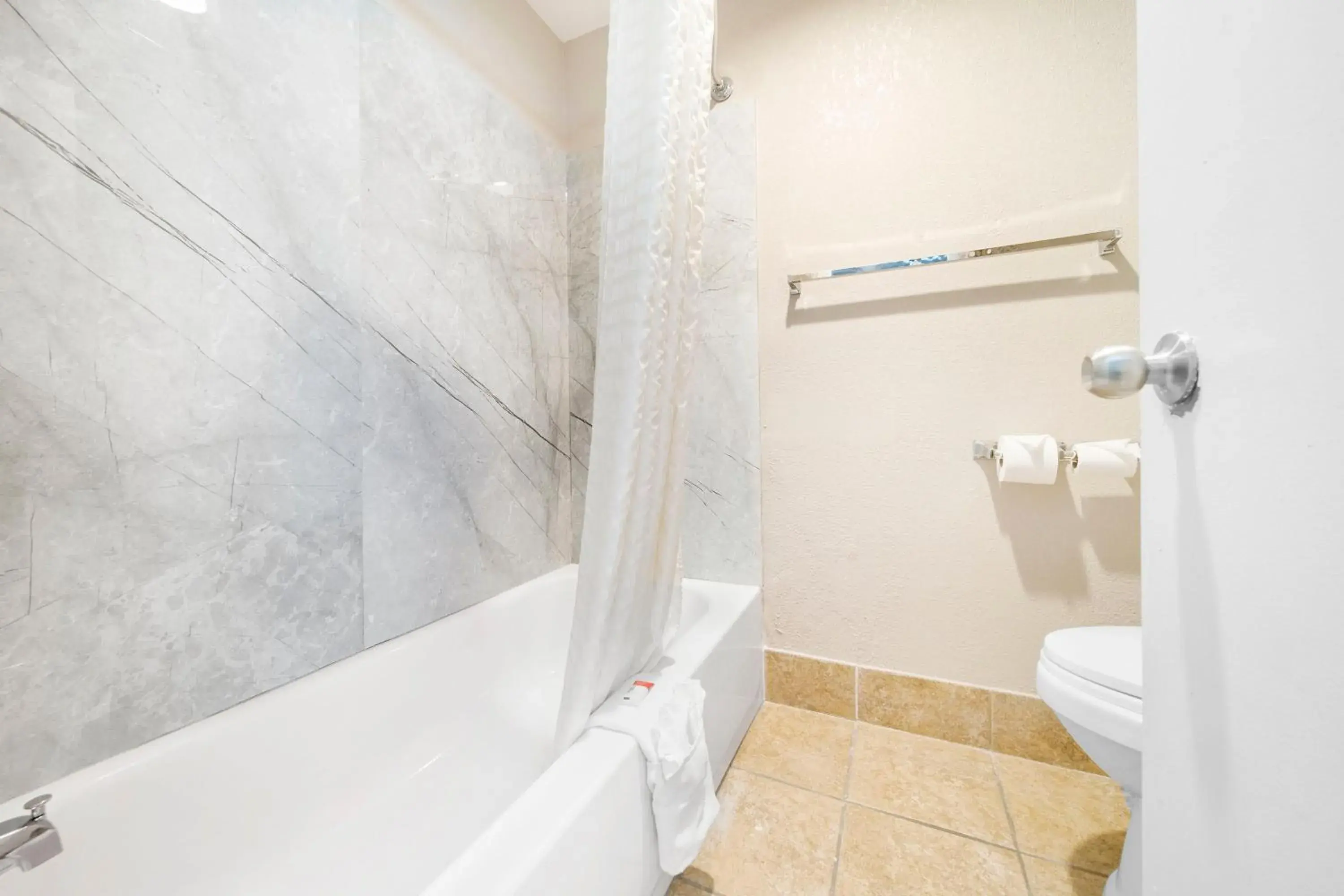 Bathroom in Baymont by Wyndham Muncie Near Ball State University Bathroom in Baymont by Wyndham Muncie Near Ball State University