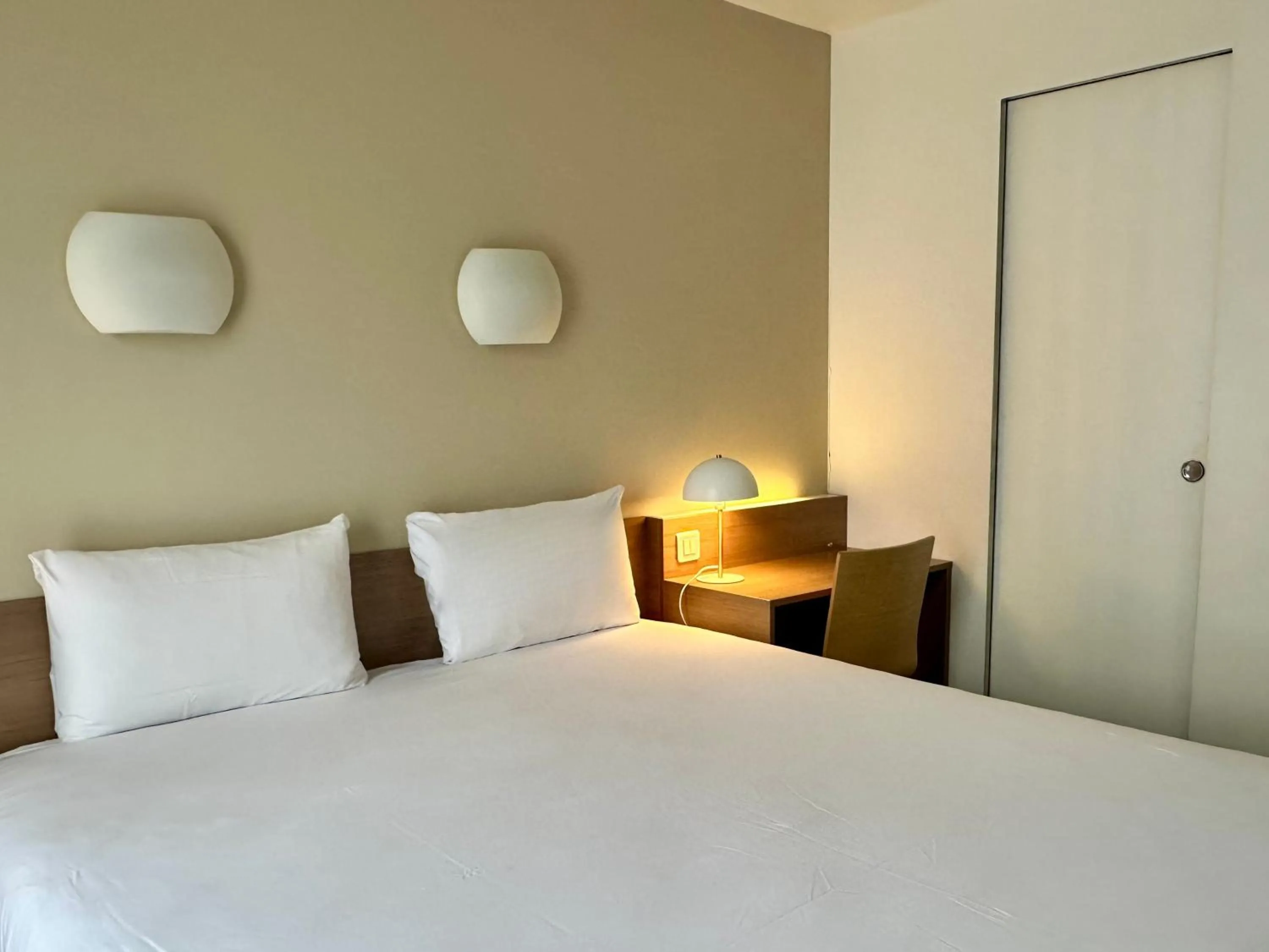 Photo of the whole room, Bed in CAMPANILE PARIS 12 - Bercy Village