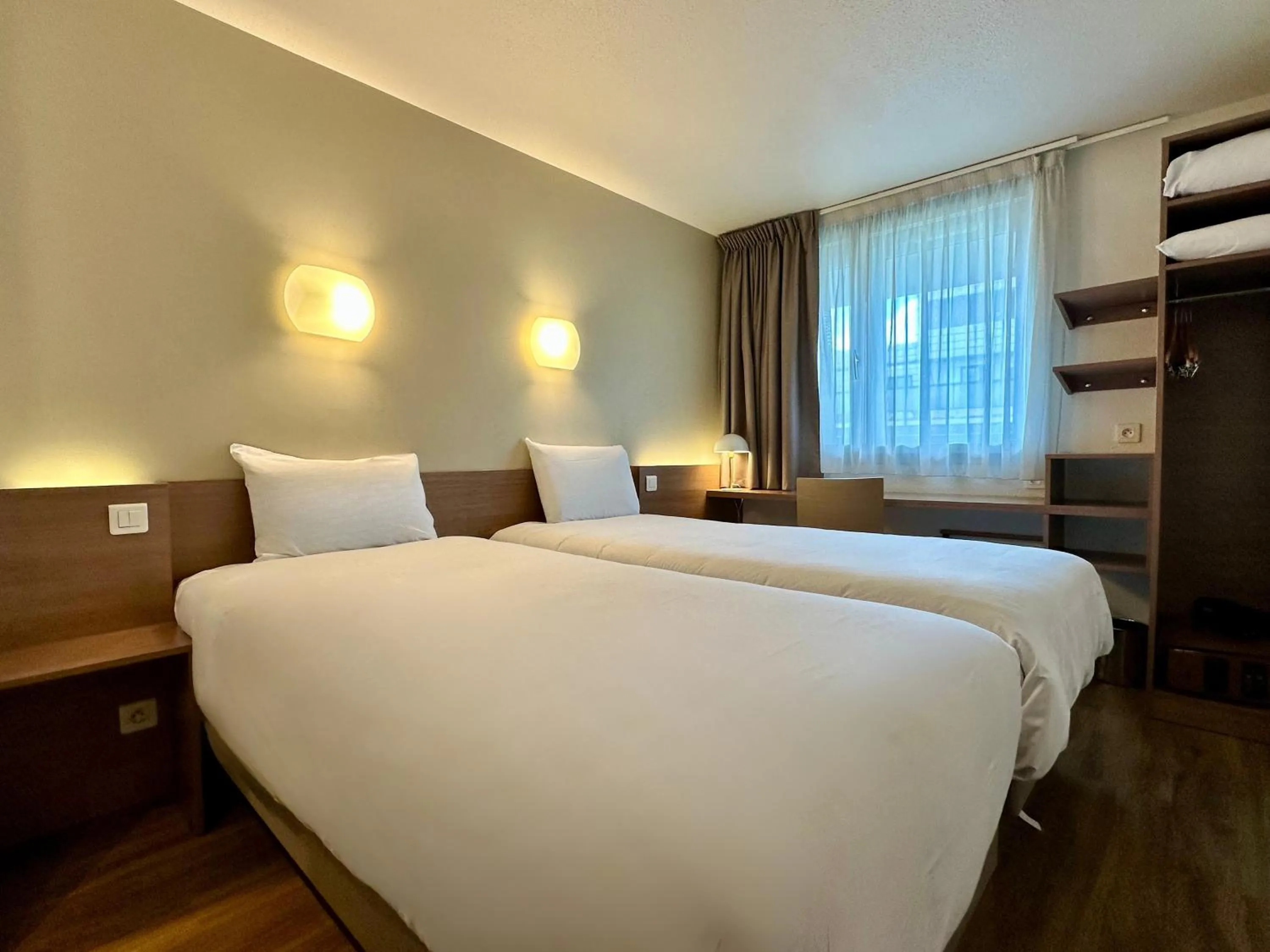 Photo of the whole room, Bed in CAMPANILE PARIS 12 - Bercy Village