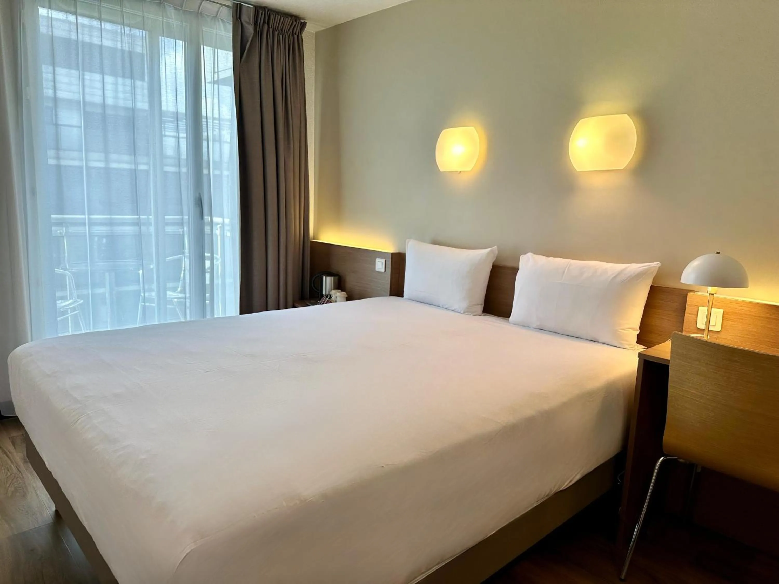Photo of the whole room, Bed in CAMPANILE PARIS 12 - Bercy Village
