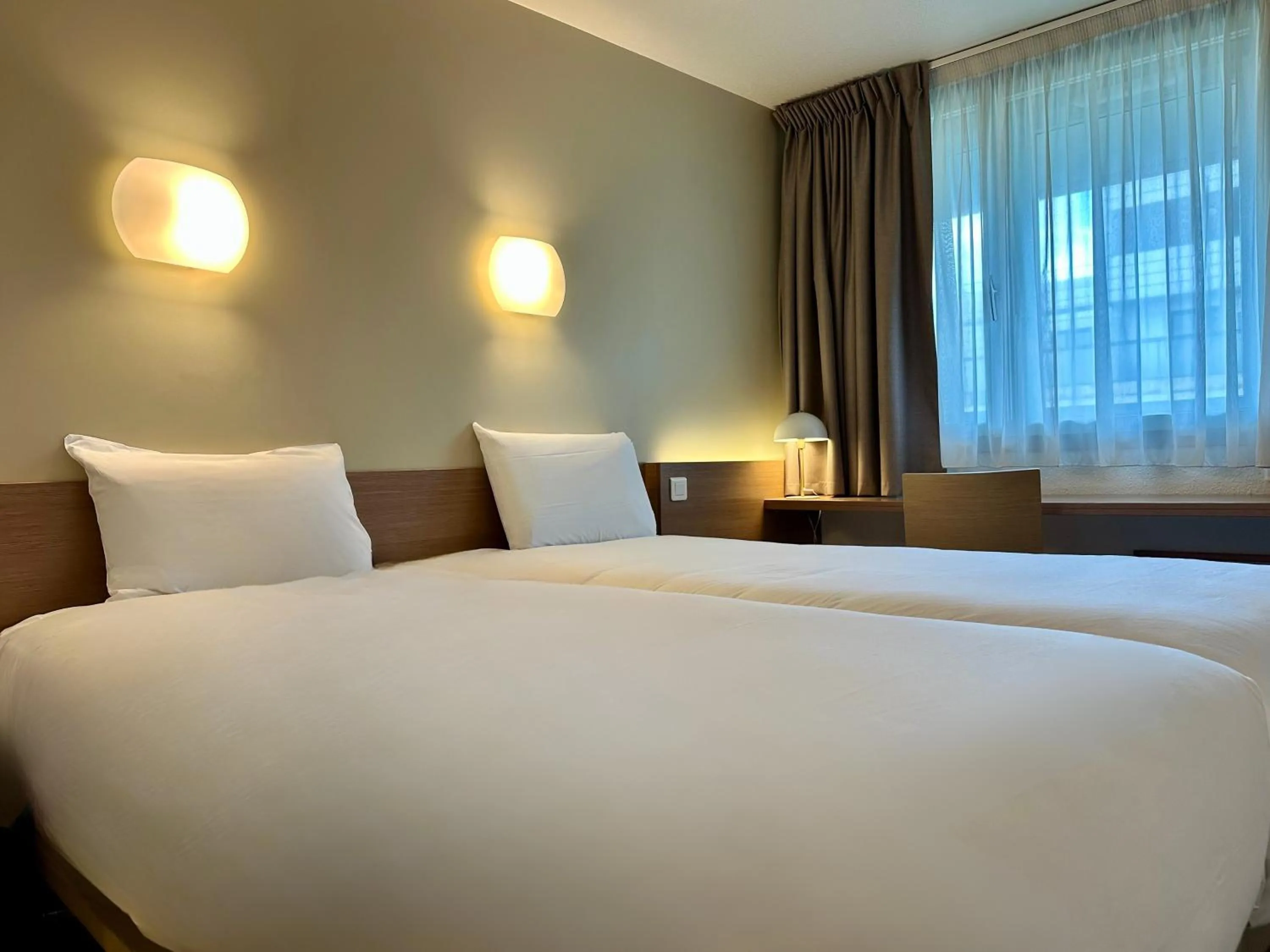 Photo of the whole room, Bed in CAMPANILE PARIS 12 - Bercy Village