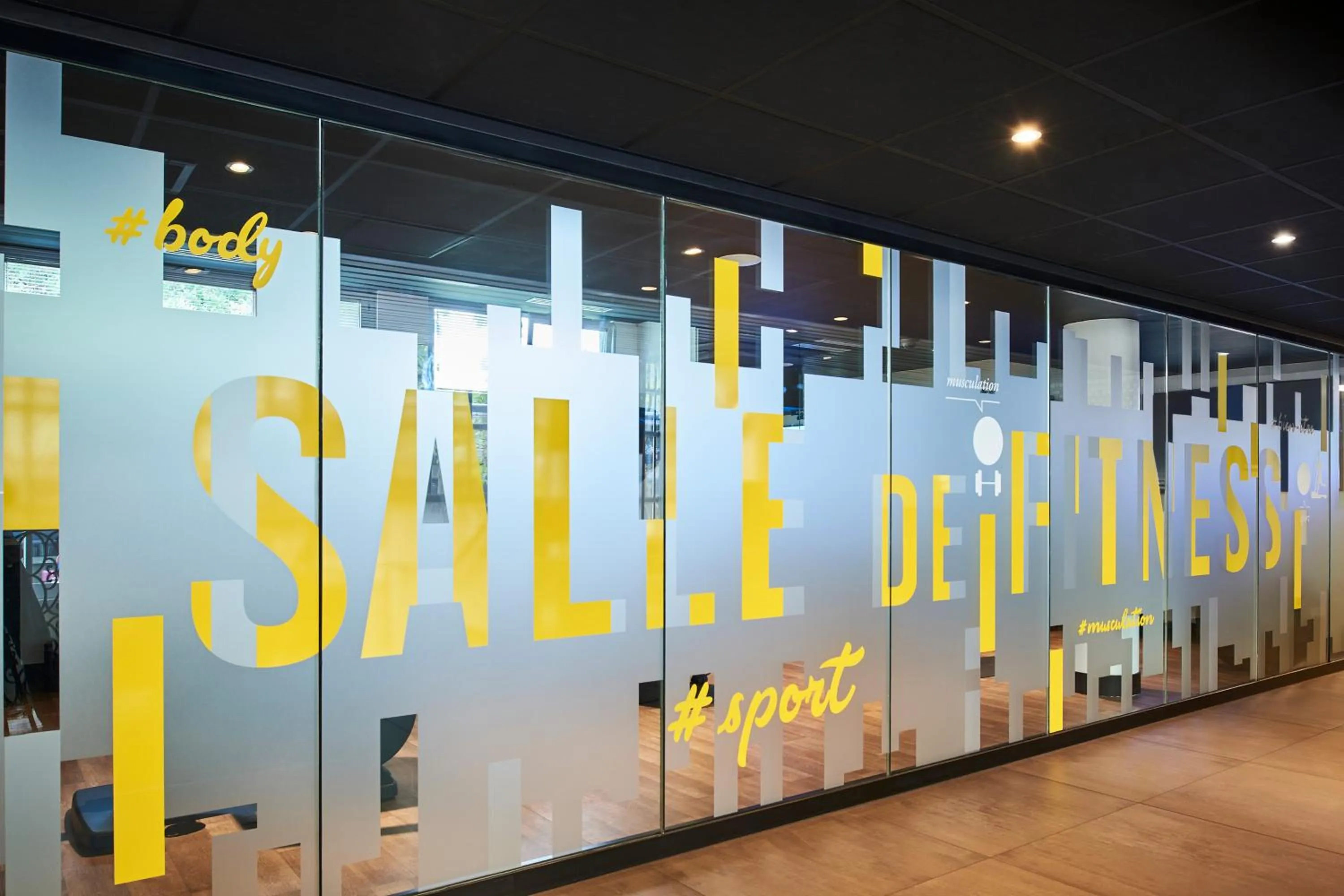 Fitness centre/facilities in CAMPANILE PARIS 12 - Bercy Village