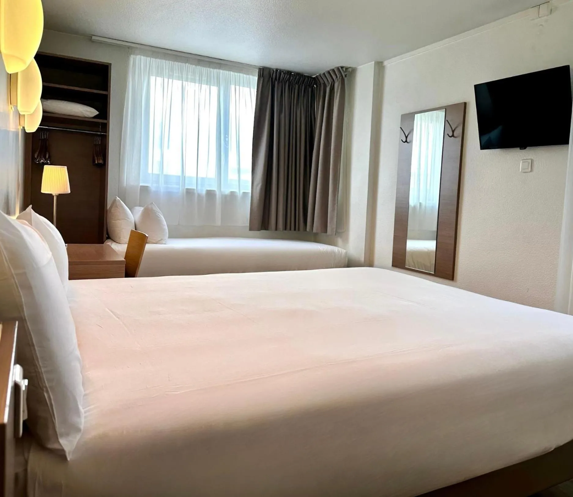 Photo of the whole room, Bed in CAMPANILE PARIS 12 - Bercy Village