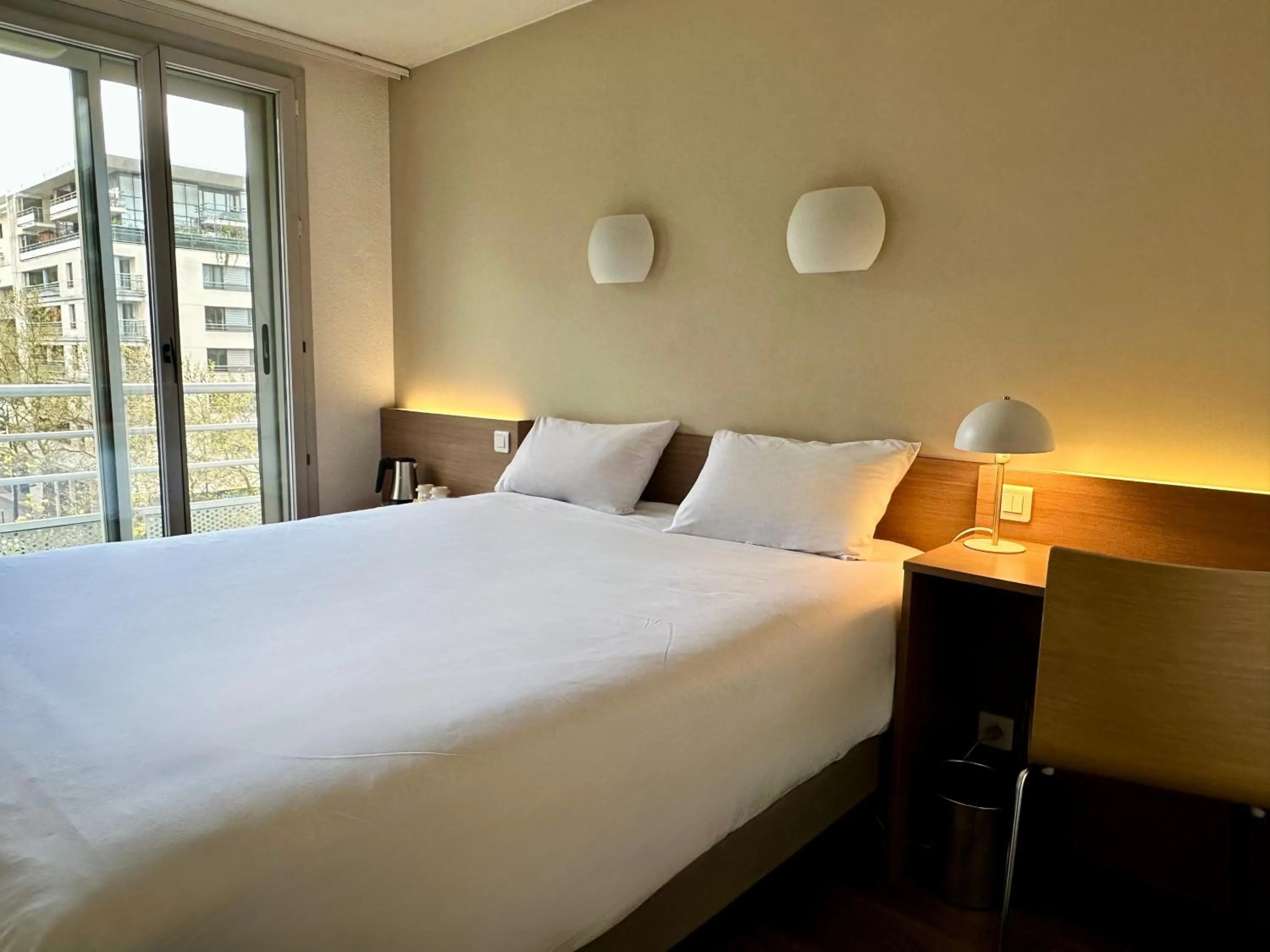 Photo of the whole room, Bed in CAMPANILE PARIS 12 - Bercy Village