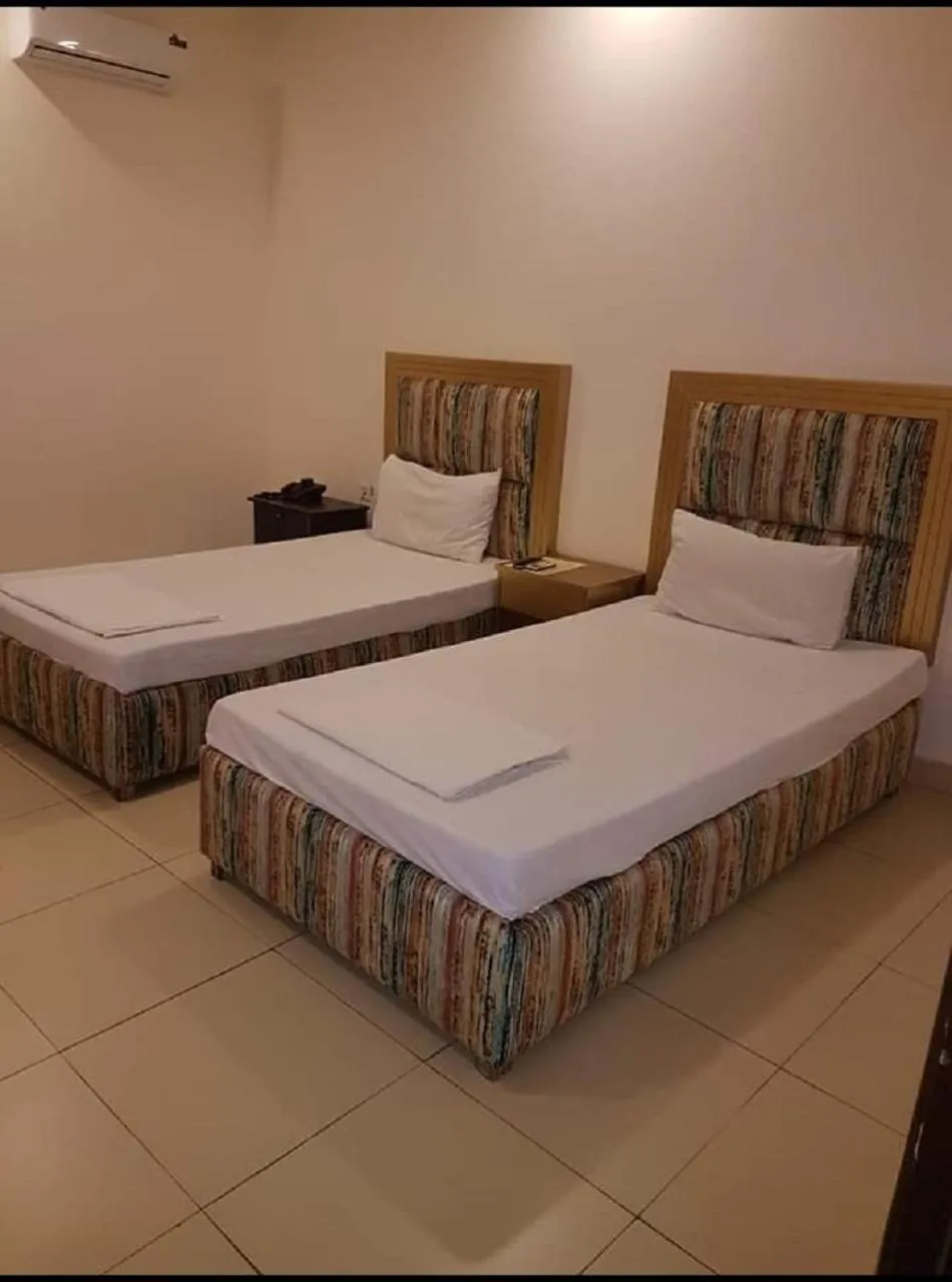 Bed in Royalton Inn Hotel - Gulberg