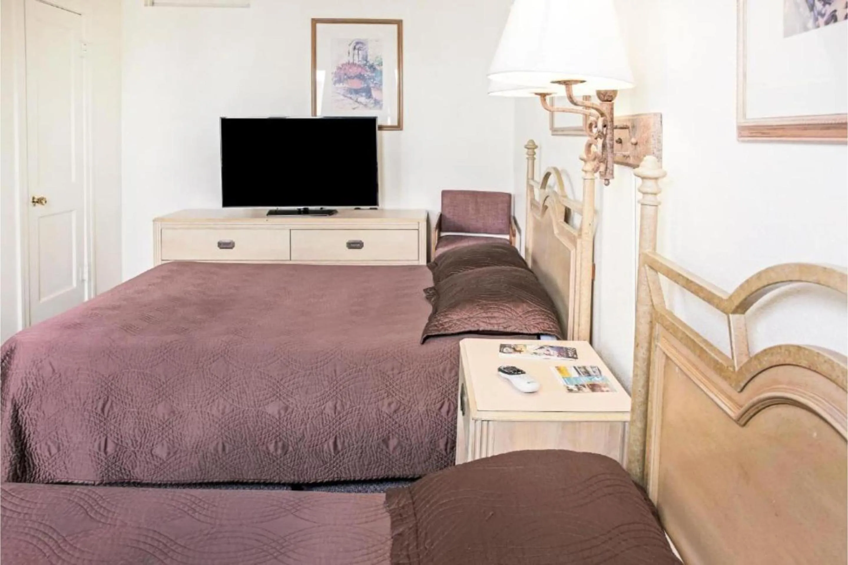 Bedroom, Bed in OYO Historic Cameron Hotel Brownsville I-69E