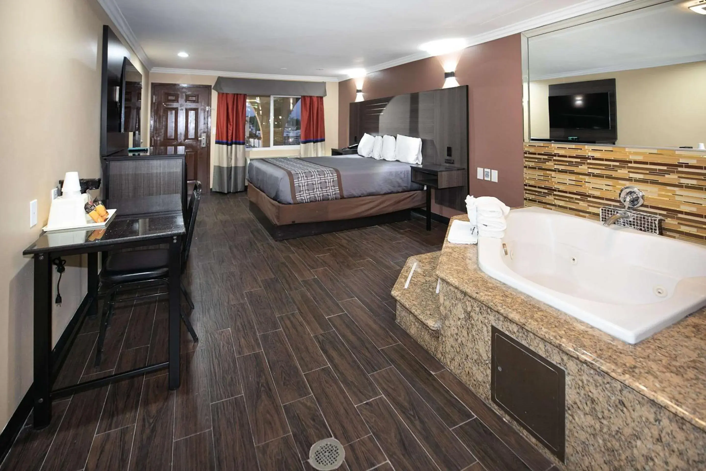 Bedroom, Bed in Rodeway Inn & Suites Bedroom, Bed in Rodeway Inn & Suites