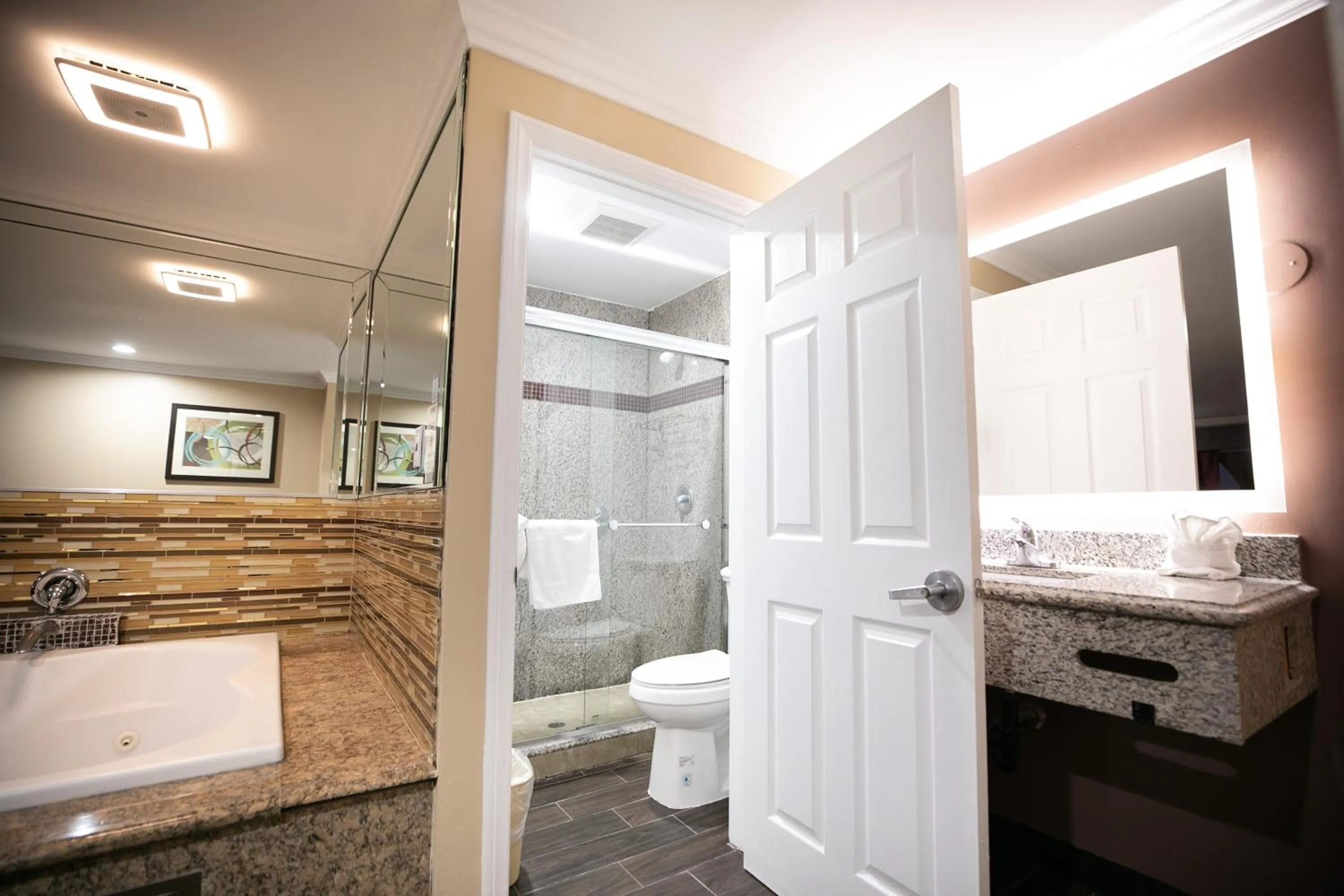 Shower in Rodeway Inn & Suites