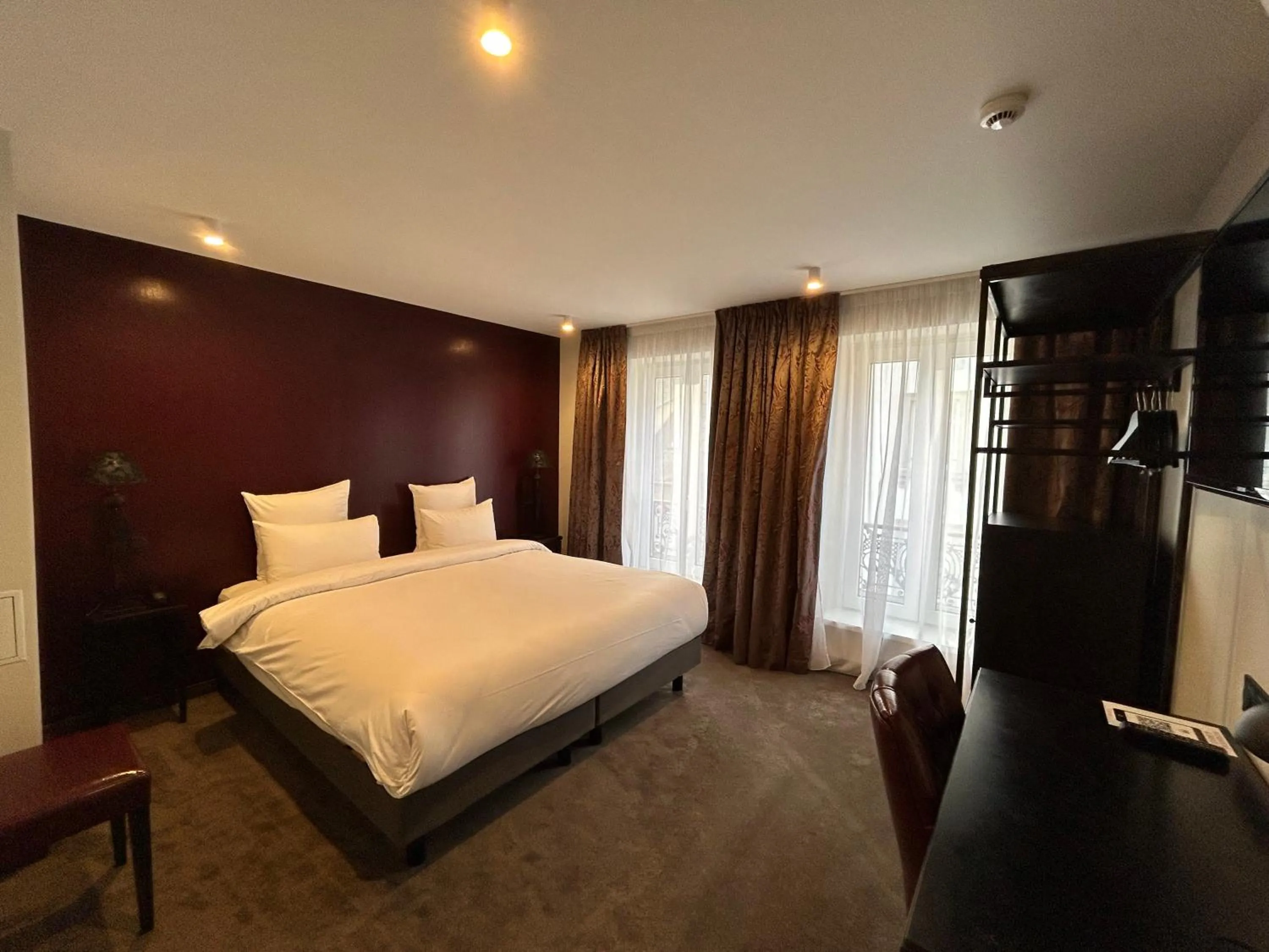 Bedroom in Hôtel Le Bristol Strasbourg Gare