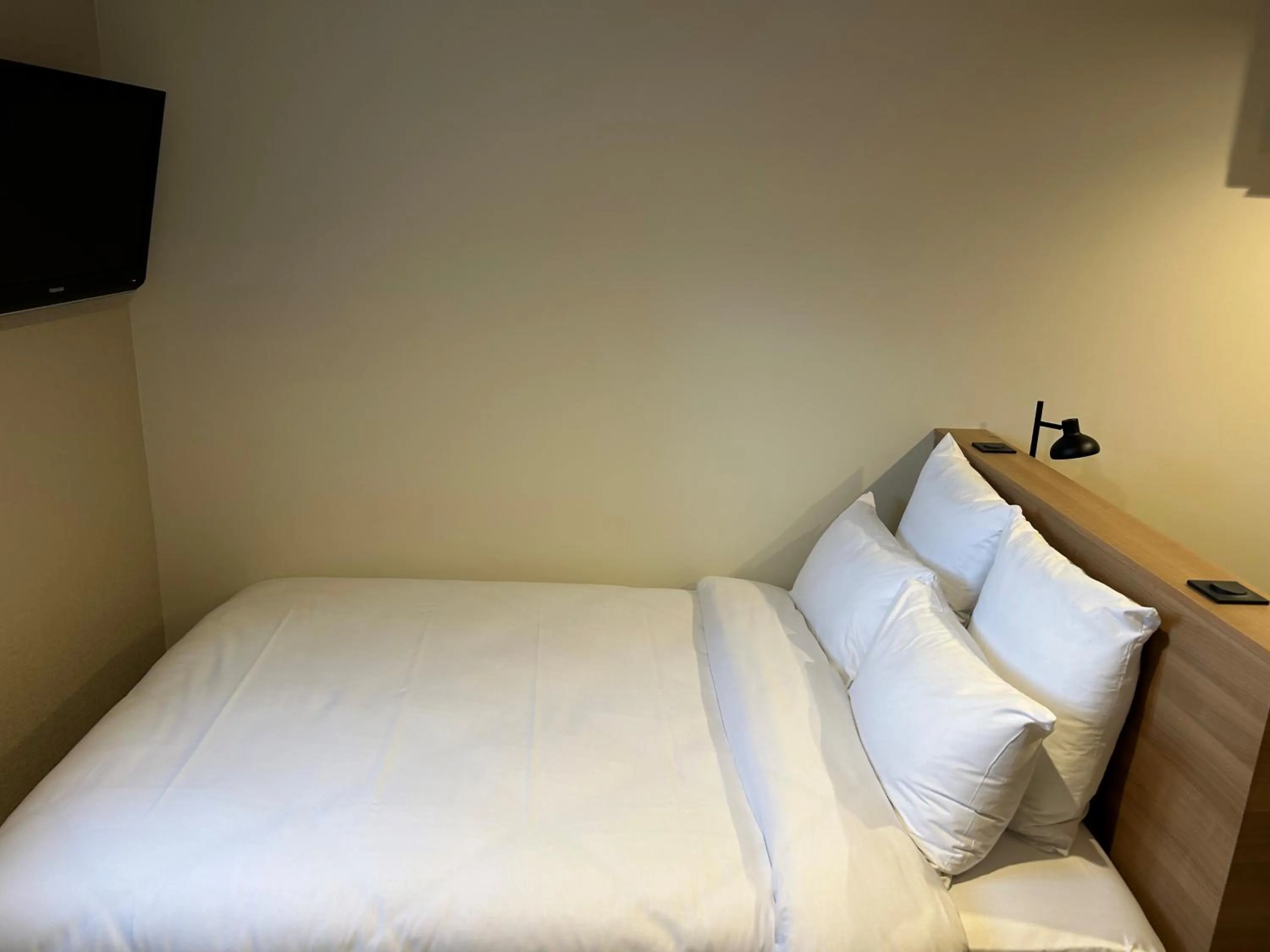 Bed in Hôtel Le Bristol Strasbourg Gare