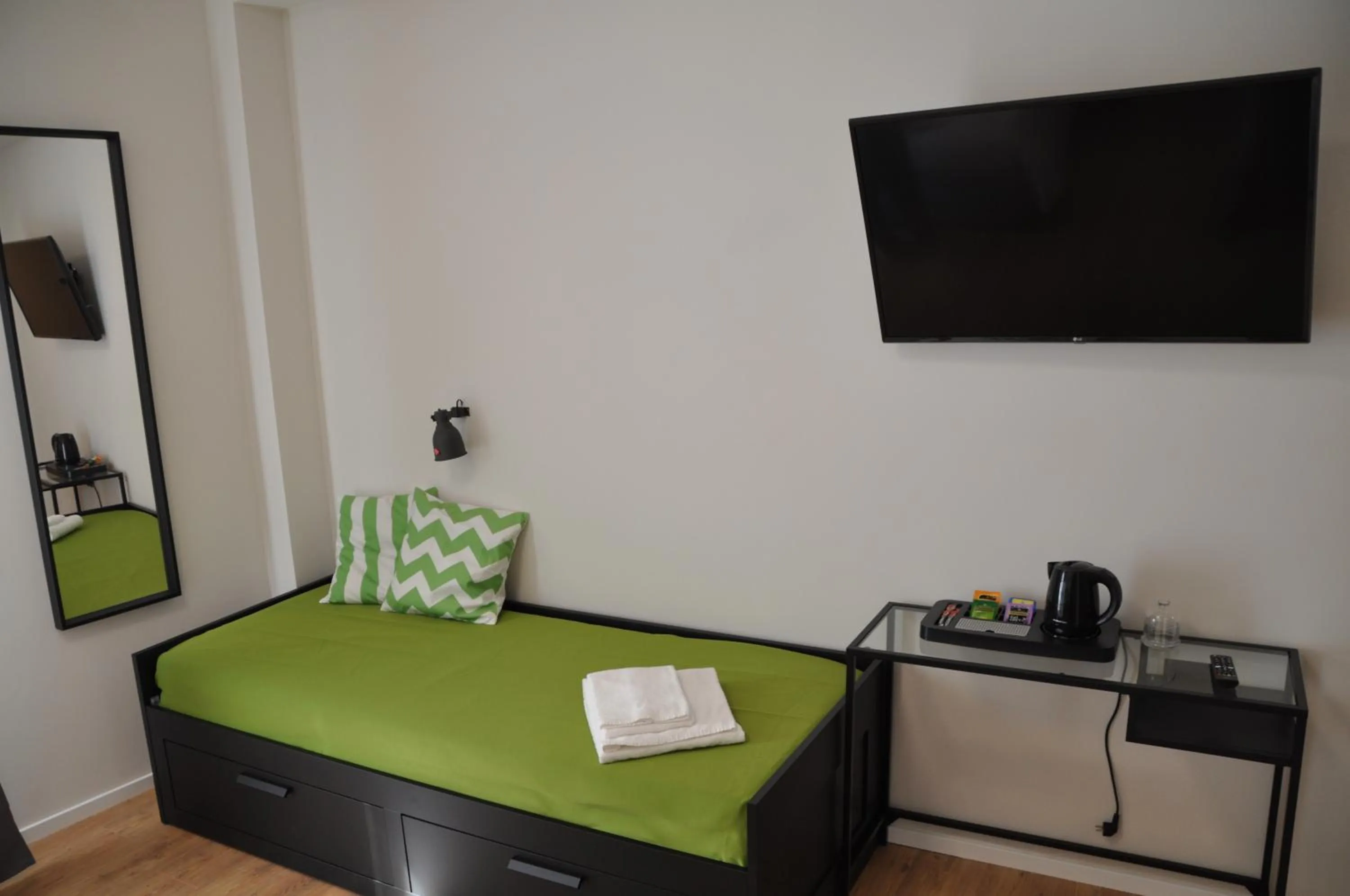 TV and multimedia, Bed in EVA LUXURY ROOMS CAGLIARI