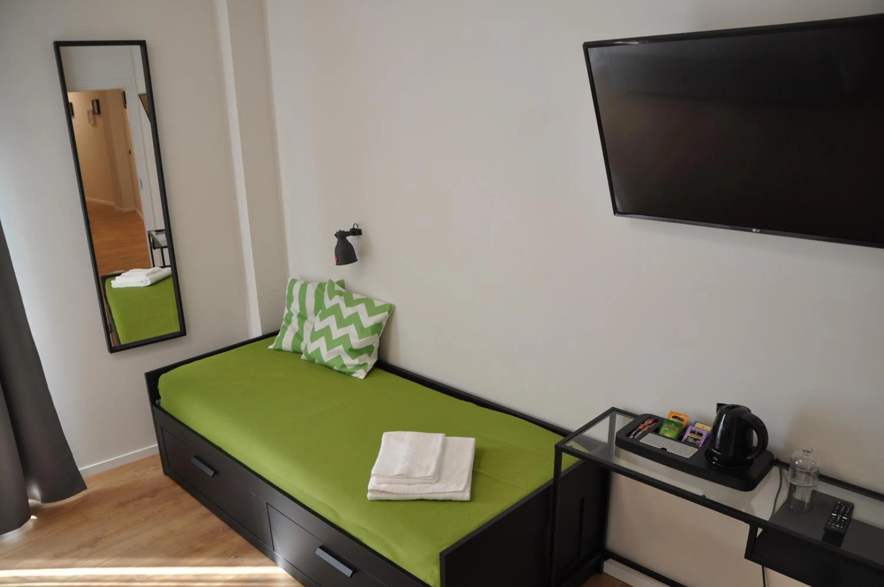 TV and multimedia, Bed in EVA LUXURY ROOMS CAGLIARI