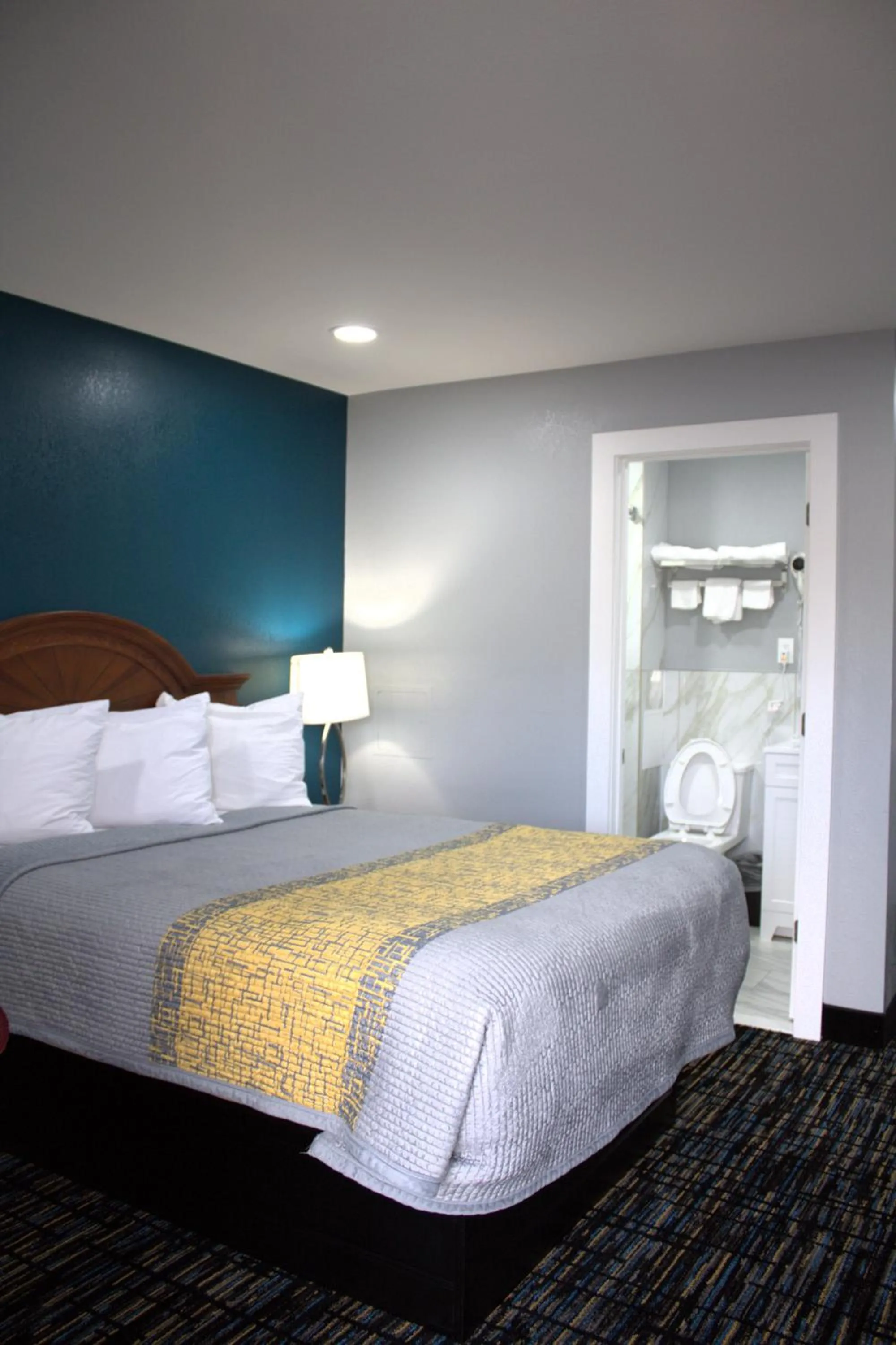 Bed in HavenPointe Inn & Suites
