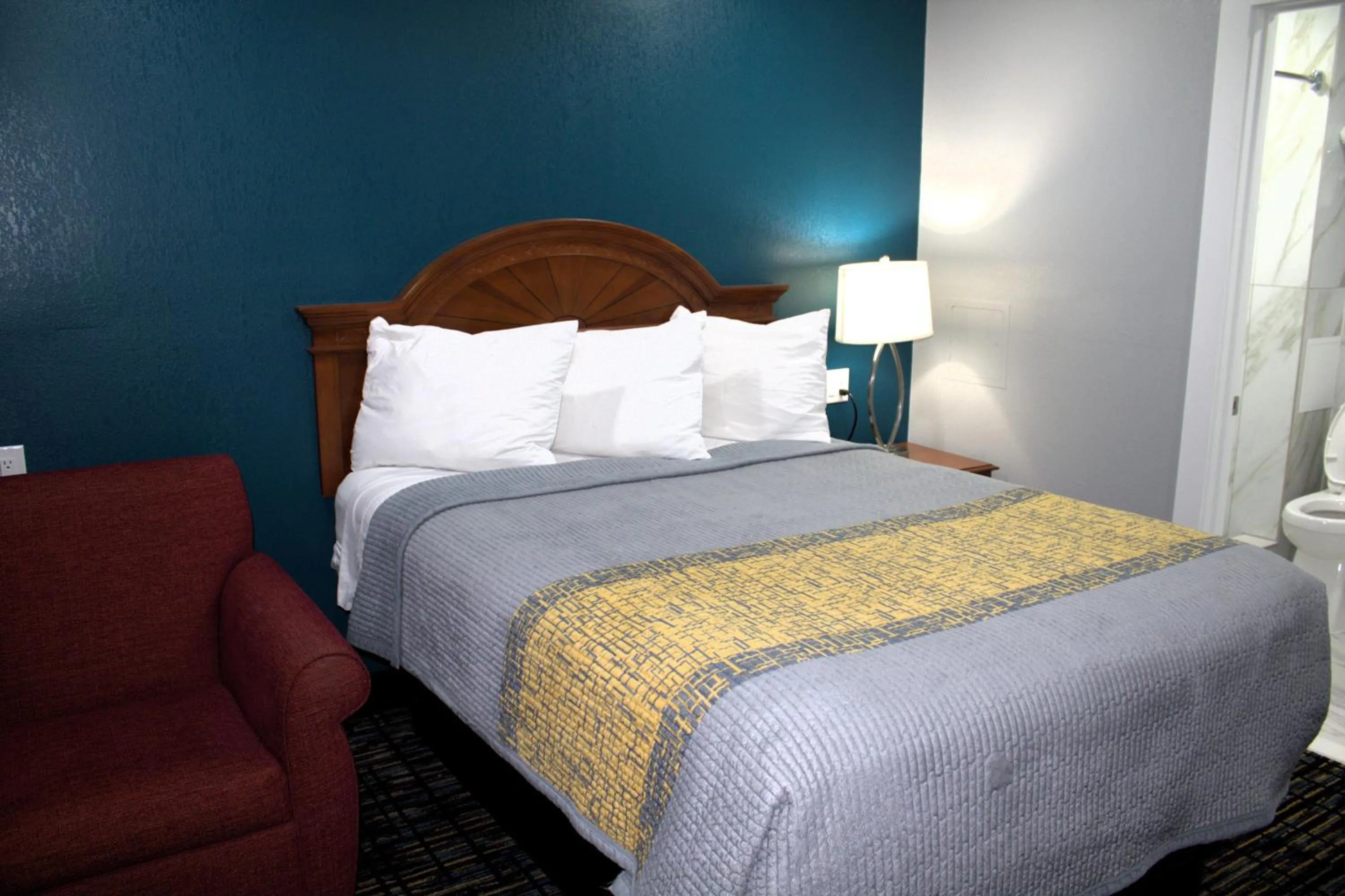 Bed in HavenPointe Inn & Suites