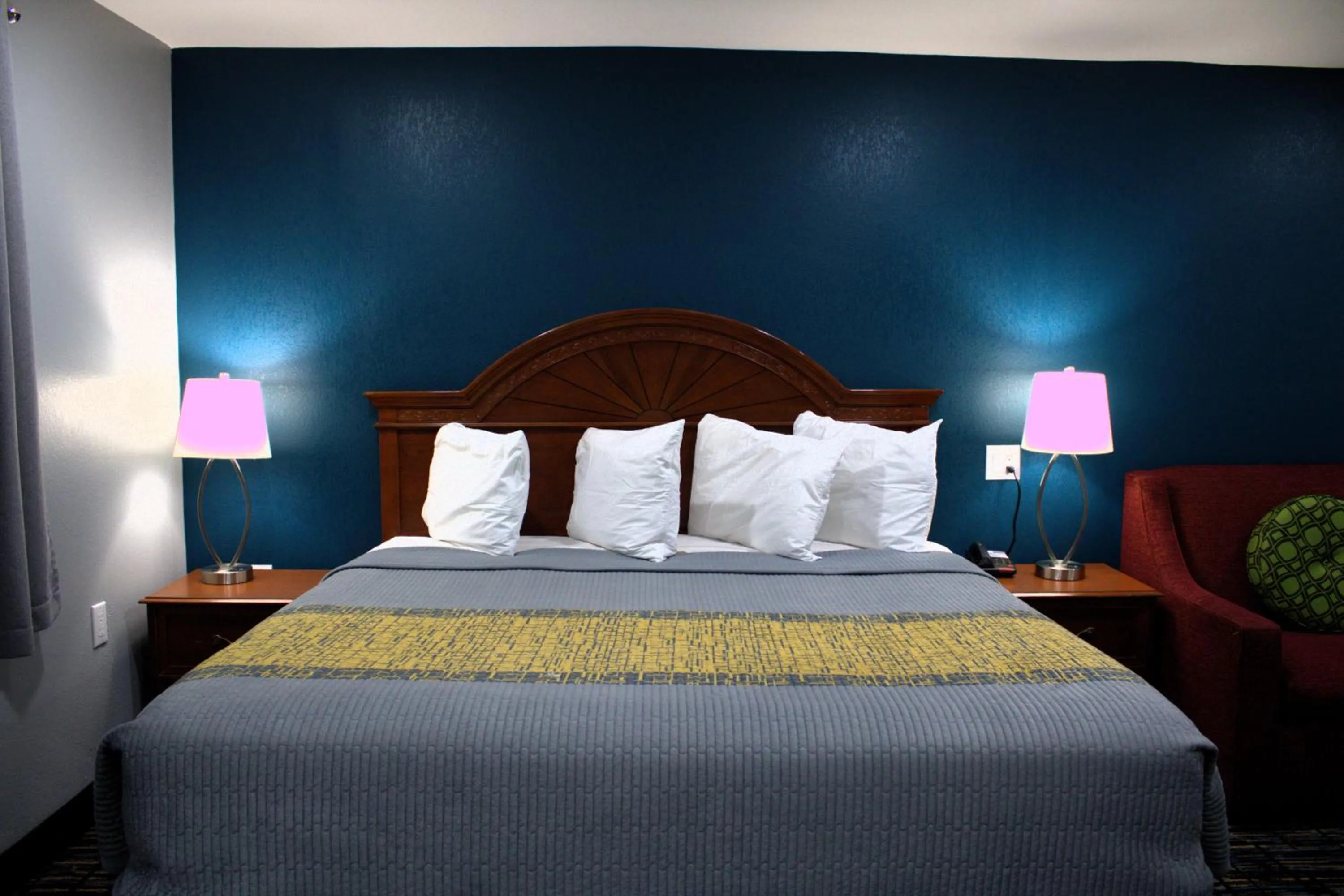 Bed in HavenPointe Inn & Suites