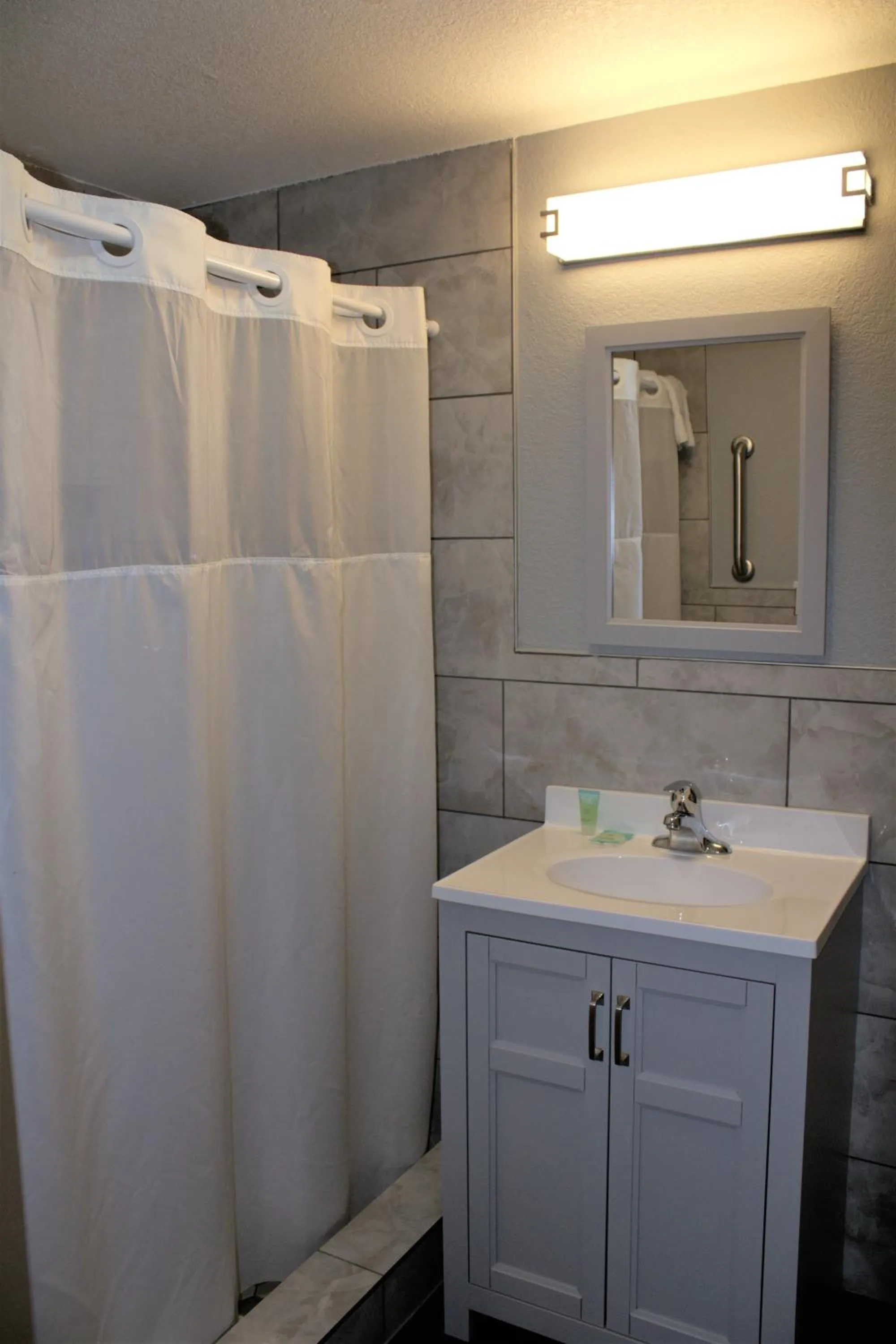 Bathroom in Hometowne Inn & Suites