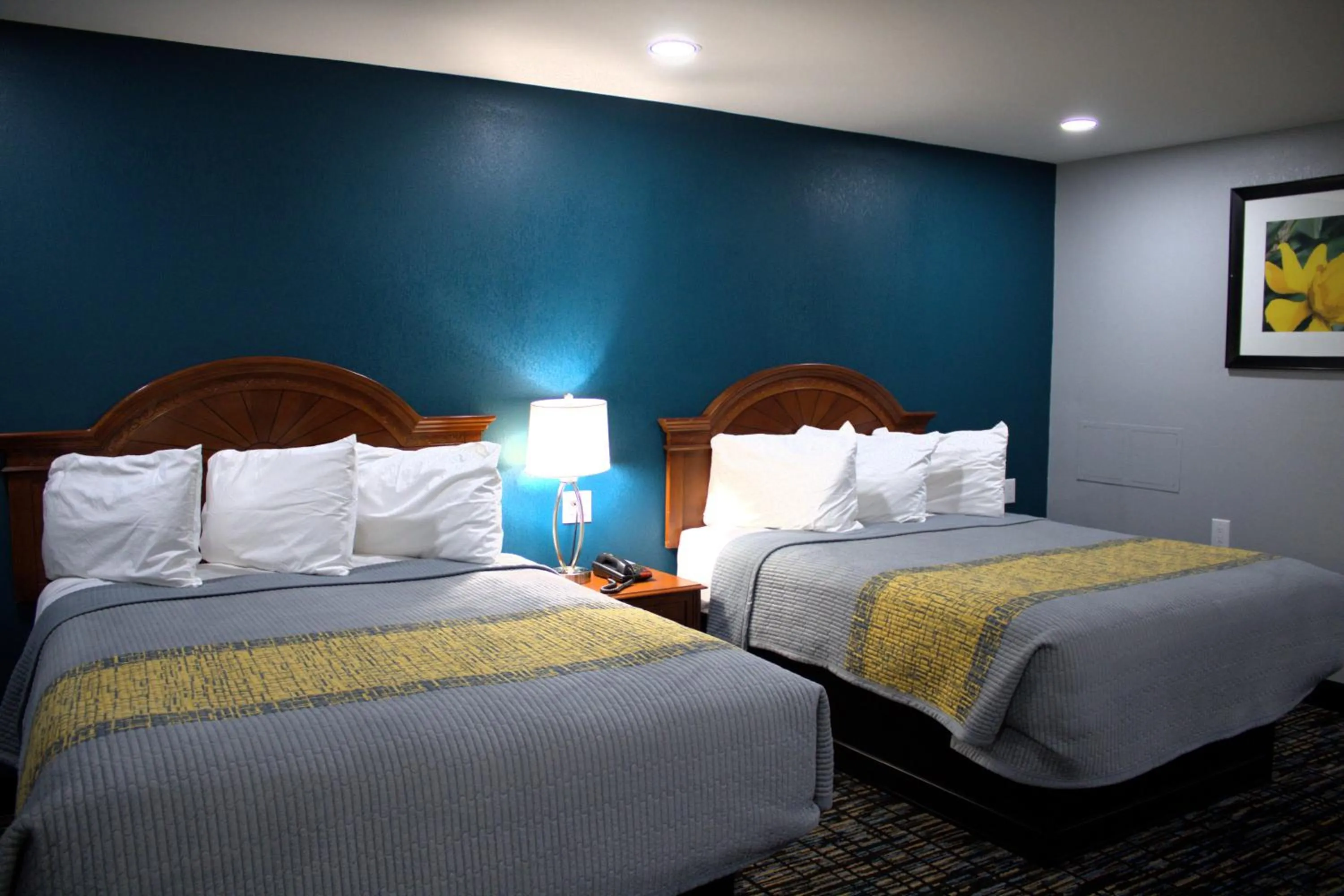 Bed in HavenPointe Inn & Suites
