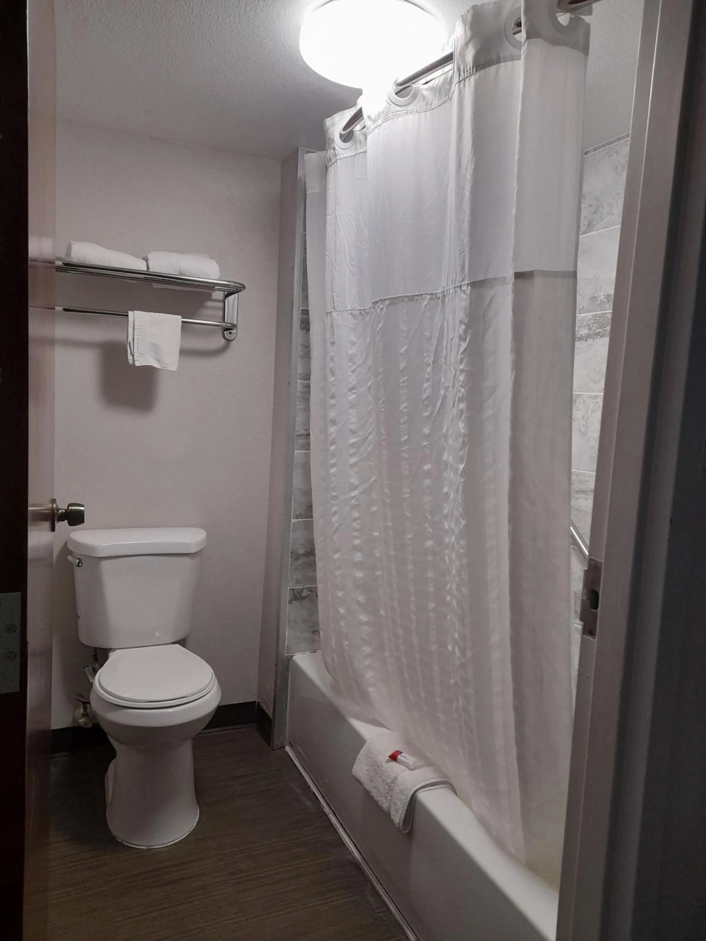 Toilet in Super 8 Motel by Wyndham near Fort Lauderdale Arpt