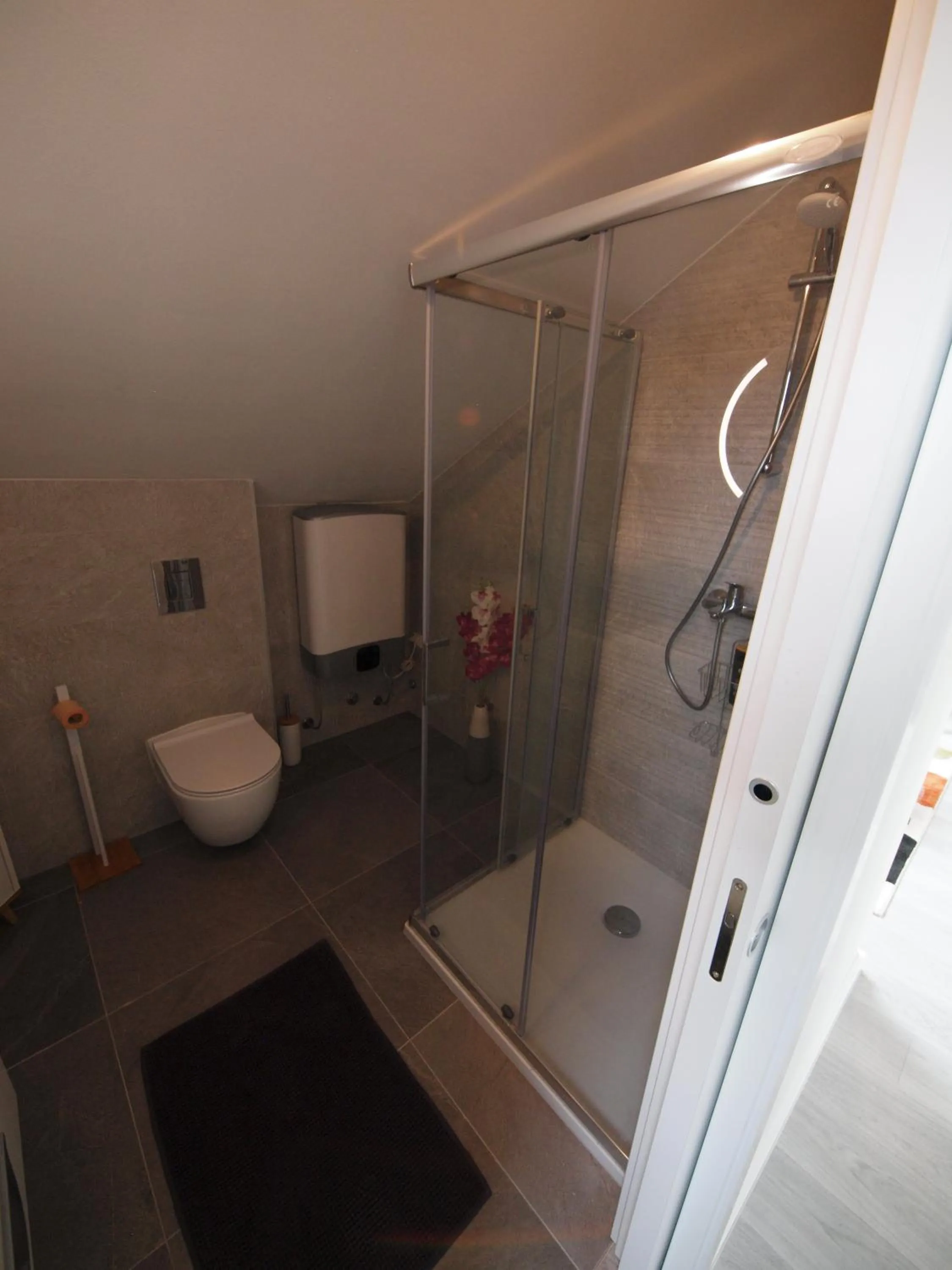 Shower in Apartments Mak & Lux - sea & sunset top view