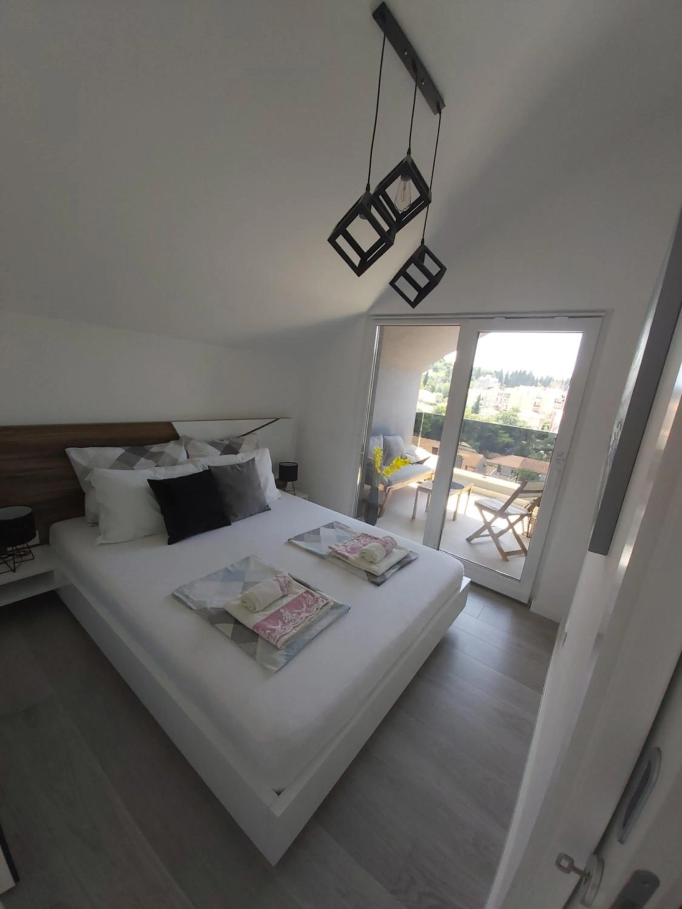 Bedroom, Bed in Apartments Mak & Lux - sea & sunset top view