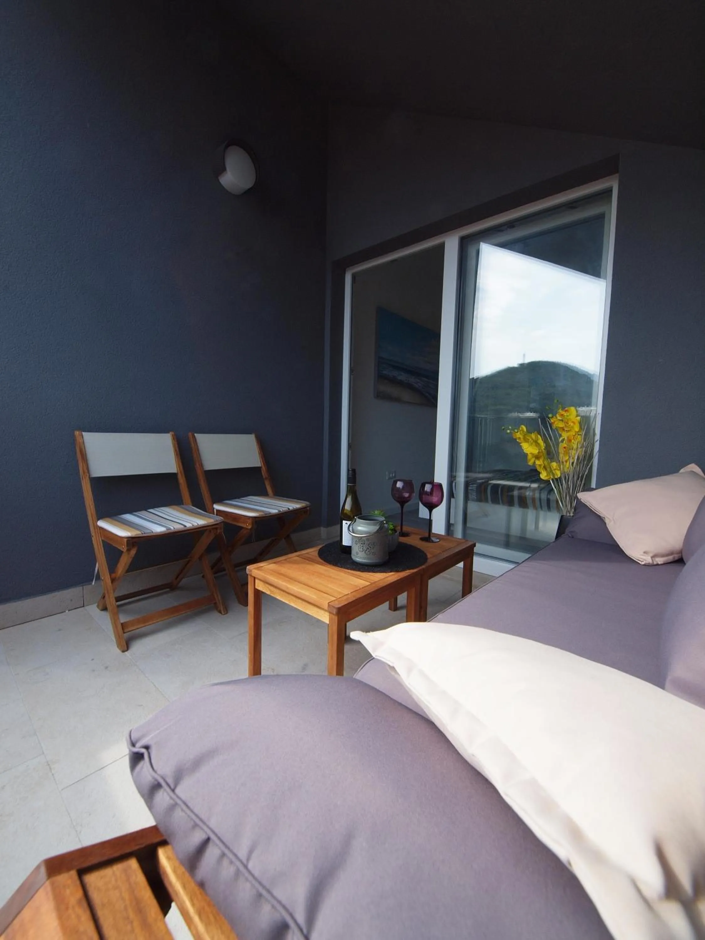 Balcony/Terrace, Bed in Apartments Mak & Lux - sea & sunset top view