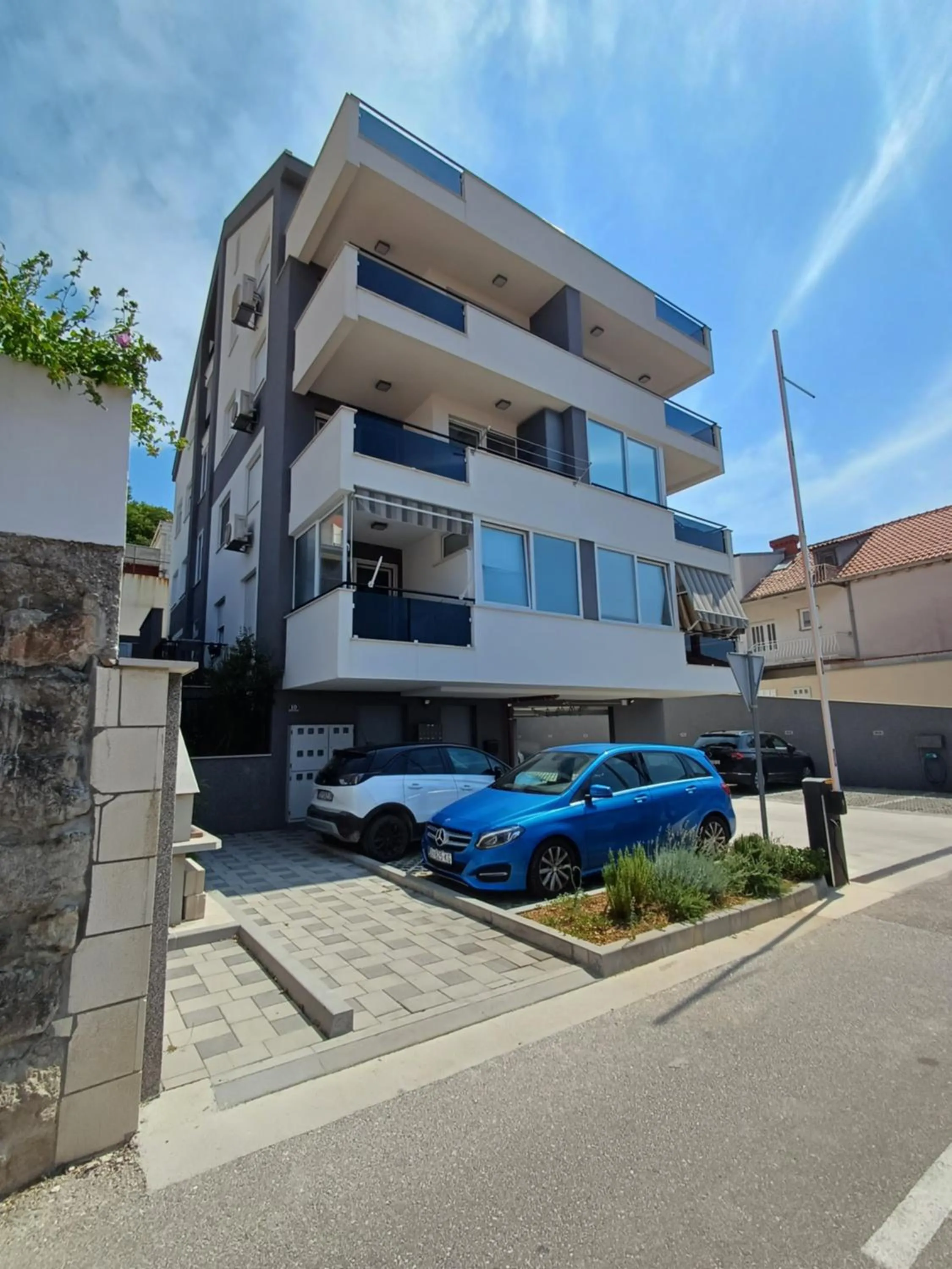 Property building in Apartments Mak & Lux - sea & sunset top view
