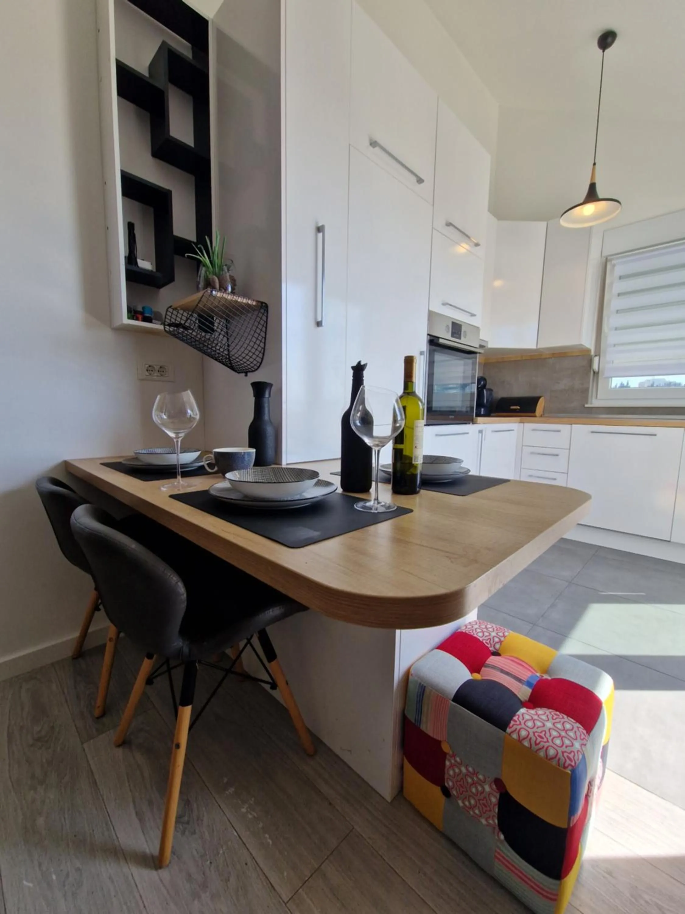 Dining area in Apartments Mak & Lux - sea & sunset top view