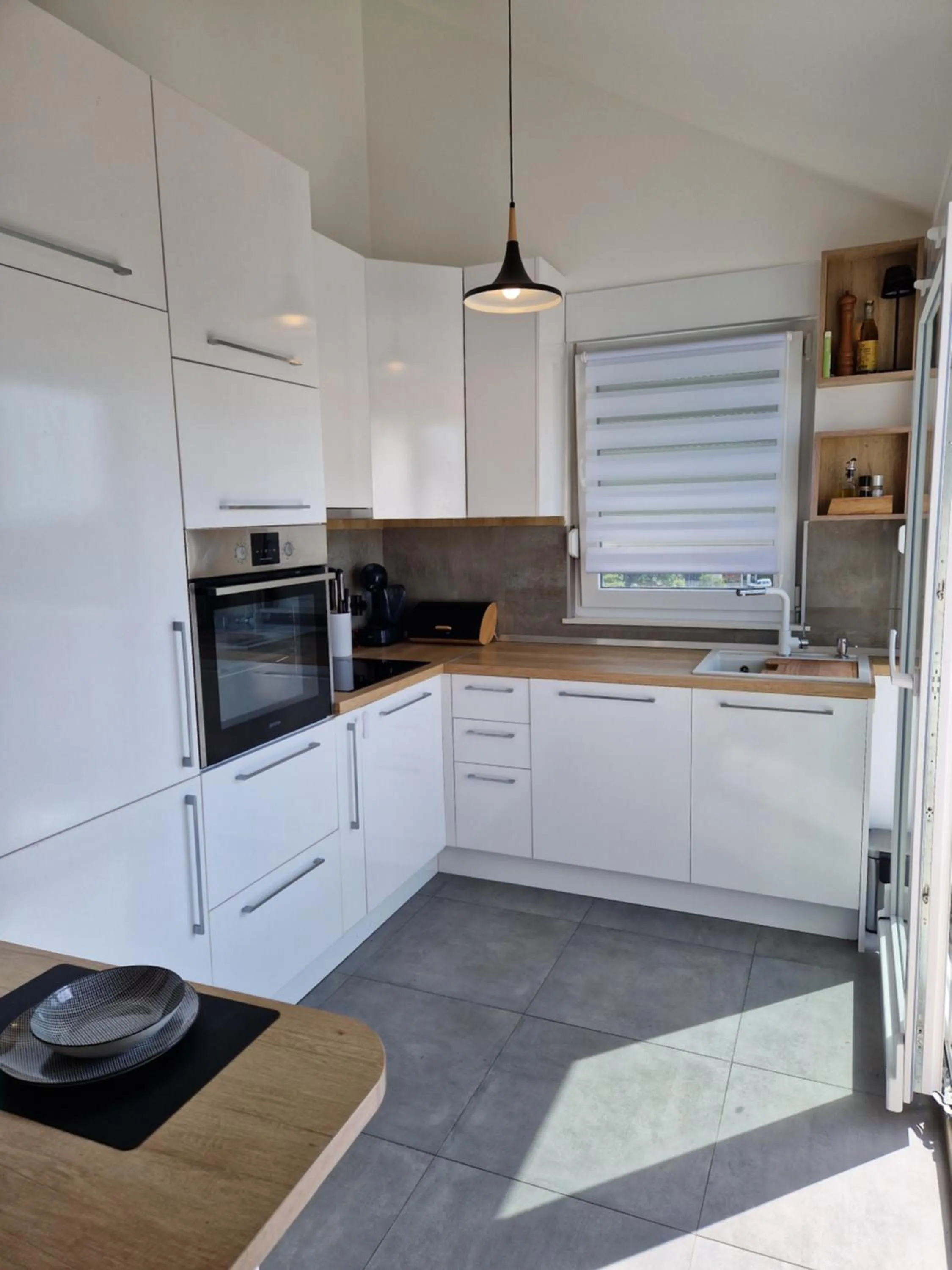 Kitchen or kitchenette in Apartments Mak & Lux - sea & sunset top view