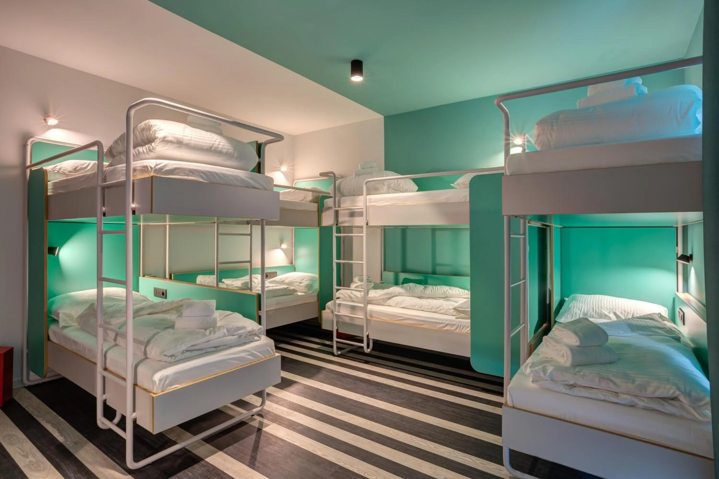 Bed in 8-Bed Mixed Dormitory Room in MEININGER Hotel Bruxelles Gare du Midi