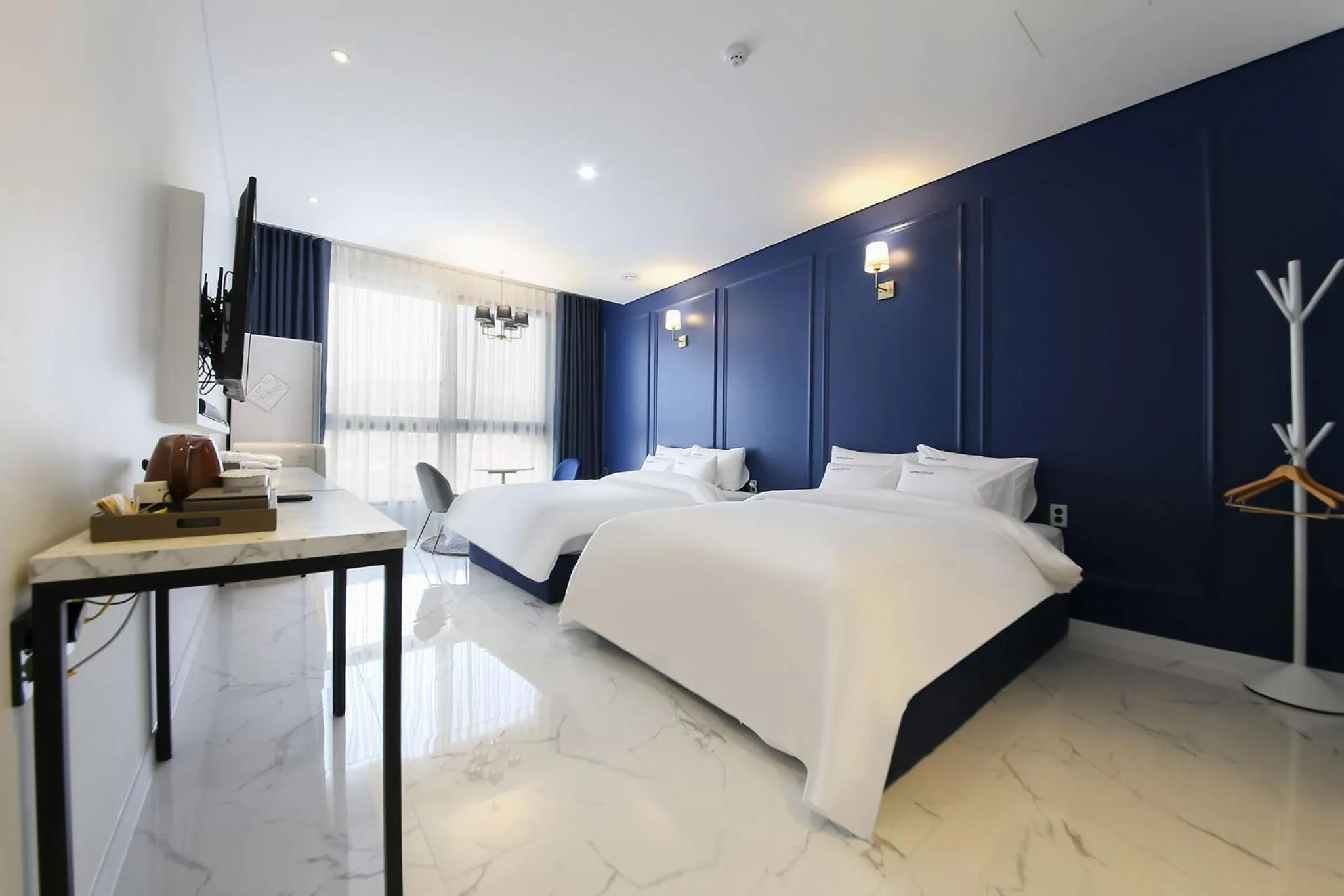 Bed in Hotel Raum Suncheon