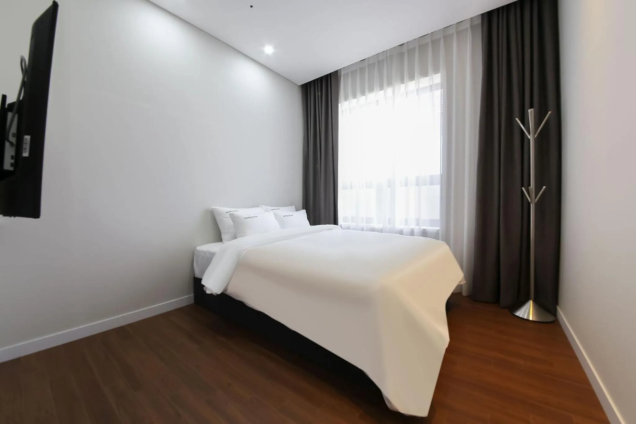 Bed in Hotel Raum Suncheon