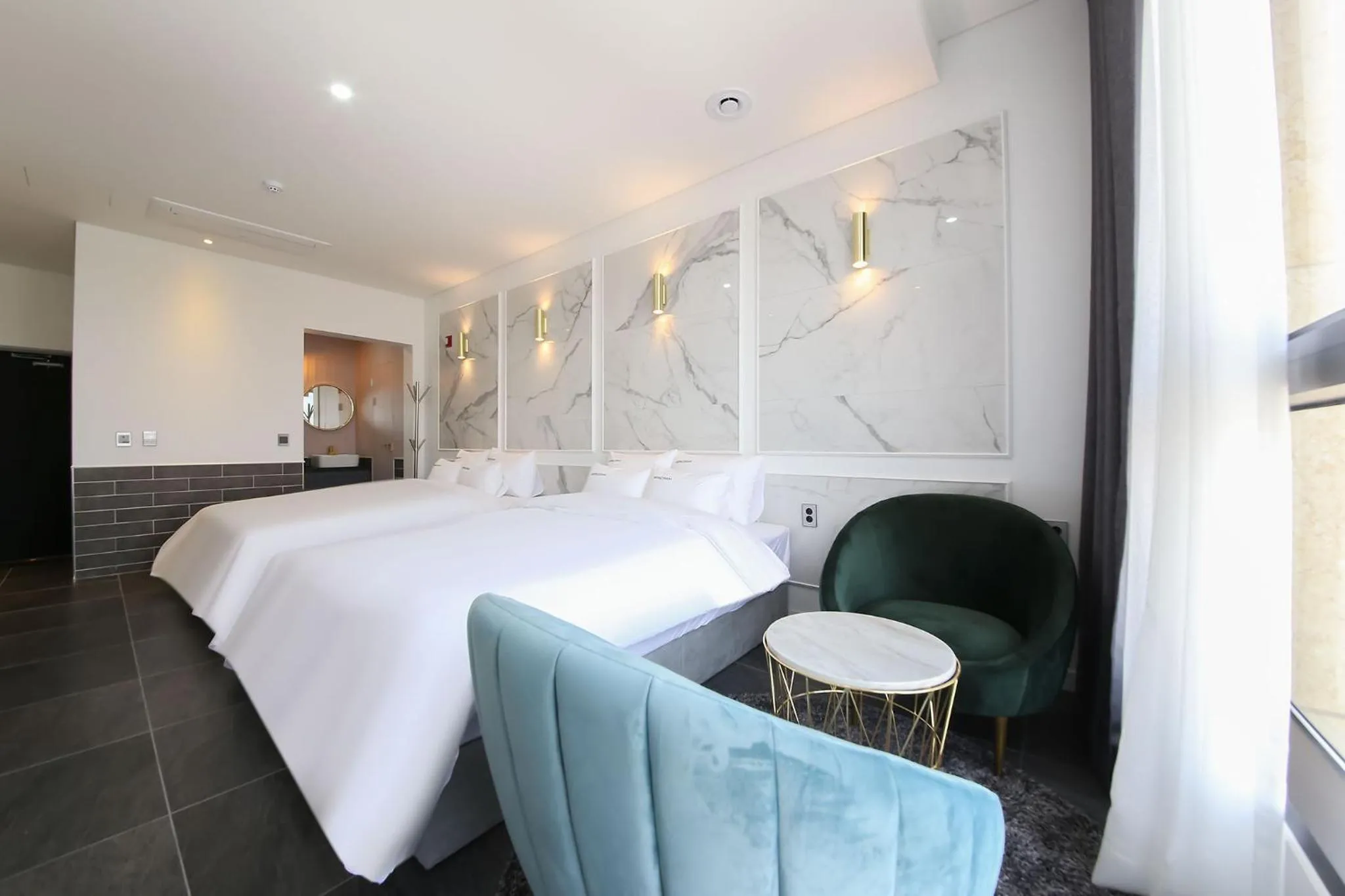 Bed in Hotel Raum Suncheon