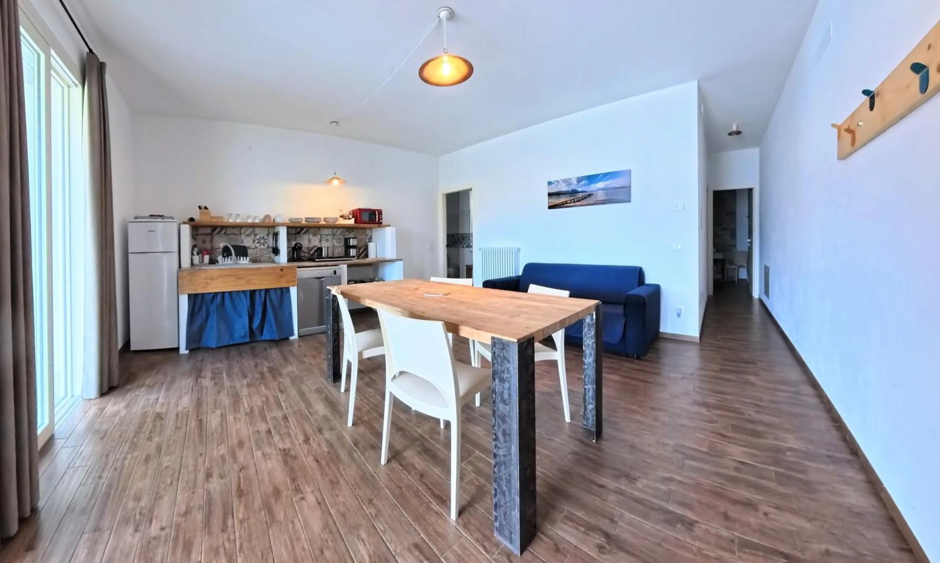 Kitchen or kitchenette in Oasi Da Vinci Apartments Lake Garda View