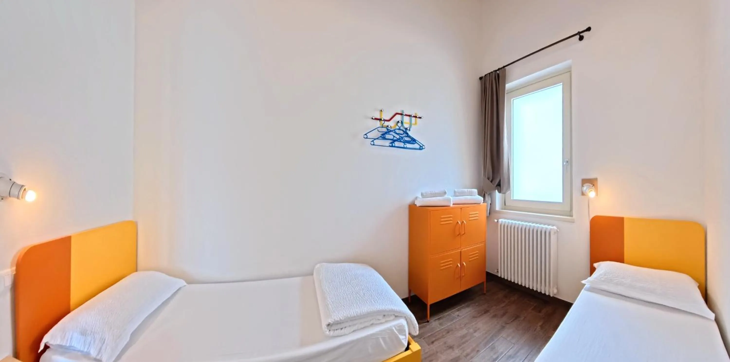 Bed in Oasi Da Vinci Apartments Lake Garda View