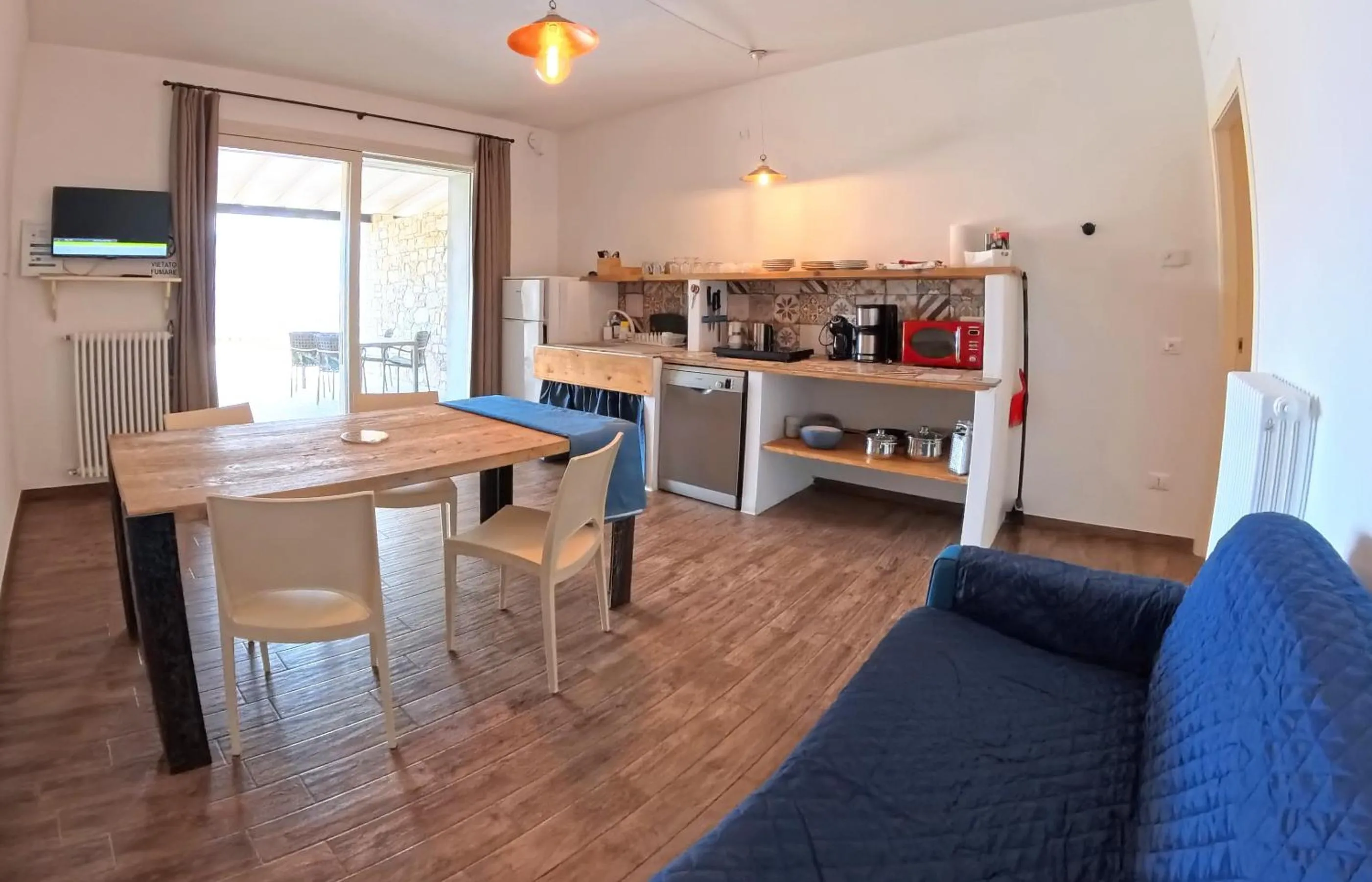 Kitchen or kitchenette in Oasi Da Vinci Apartments Lake Garda View