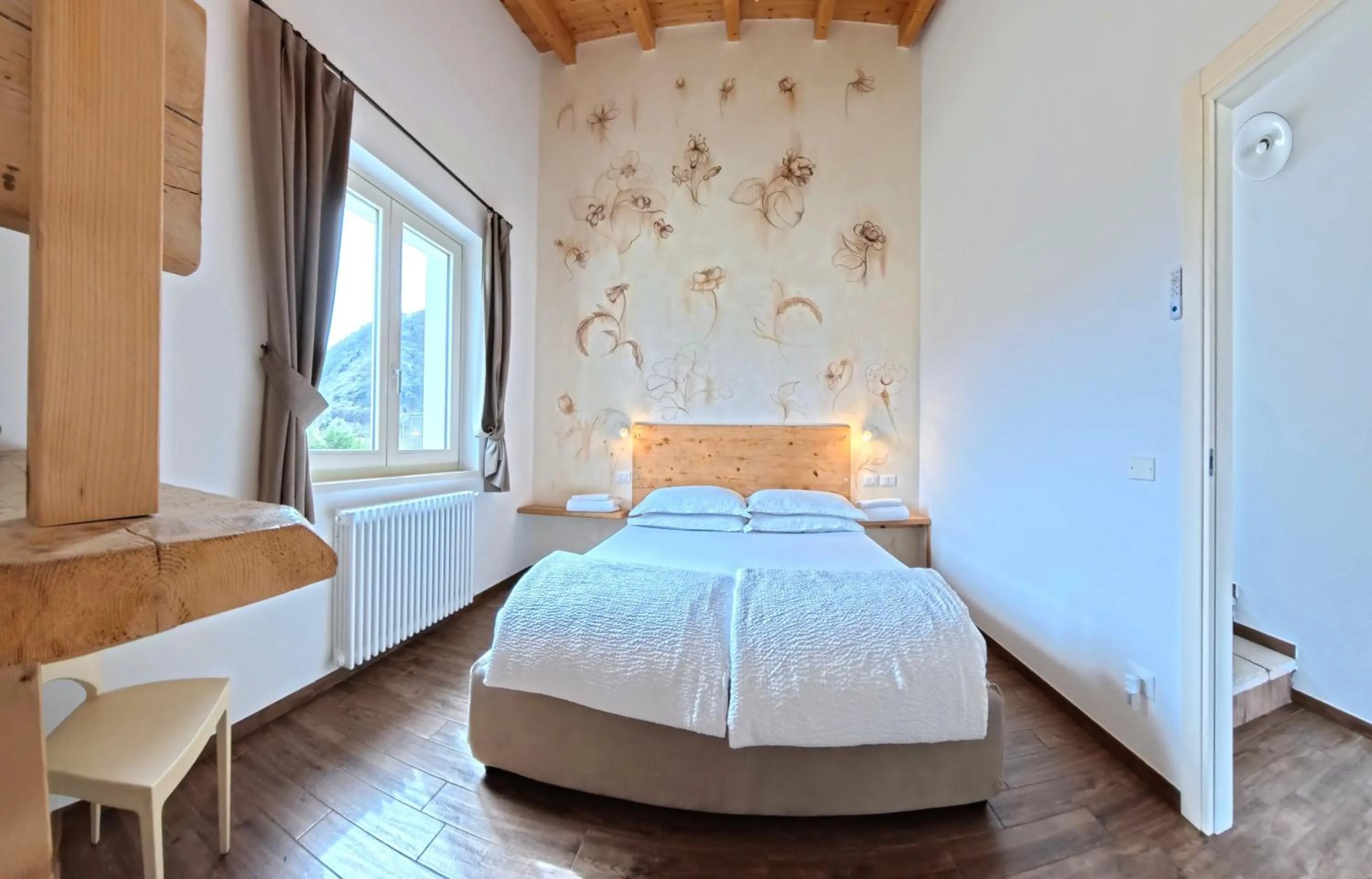 Bed in Oasi Da Vinci Apartments Lake Garda View