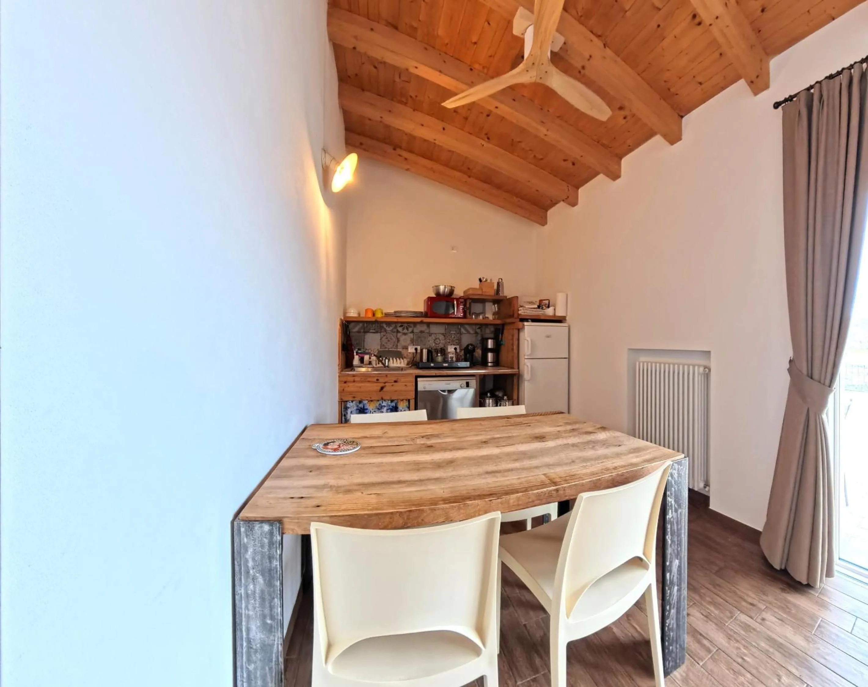Kitchen or kitchenette in Oasi Da Vinci Apartments Lake Garda View