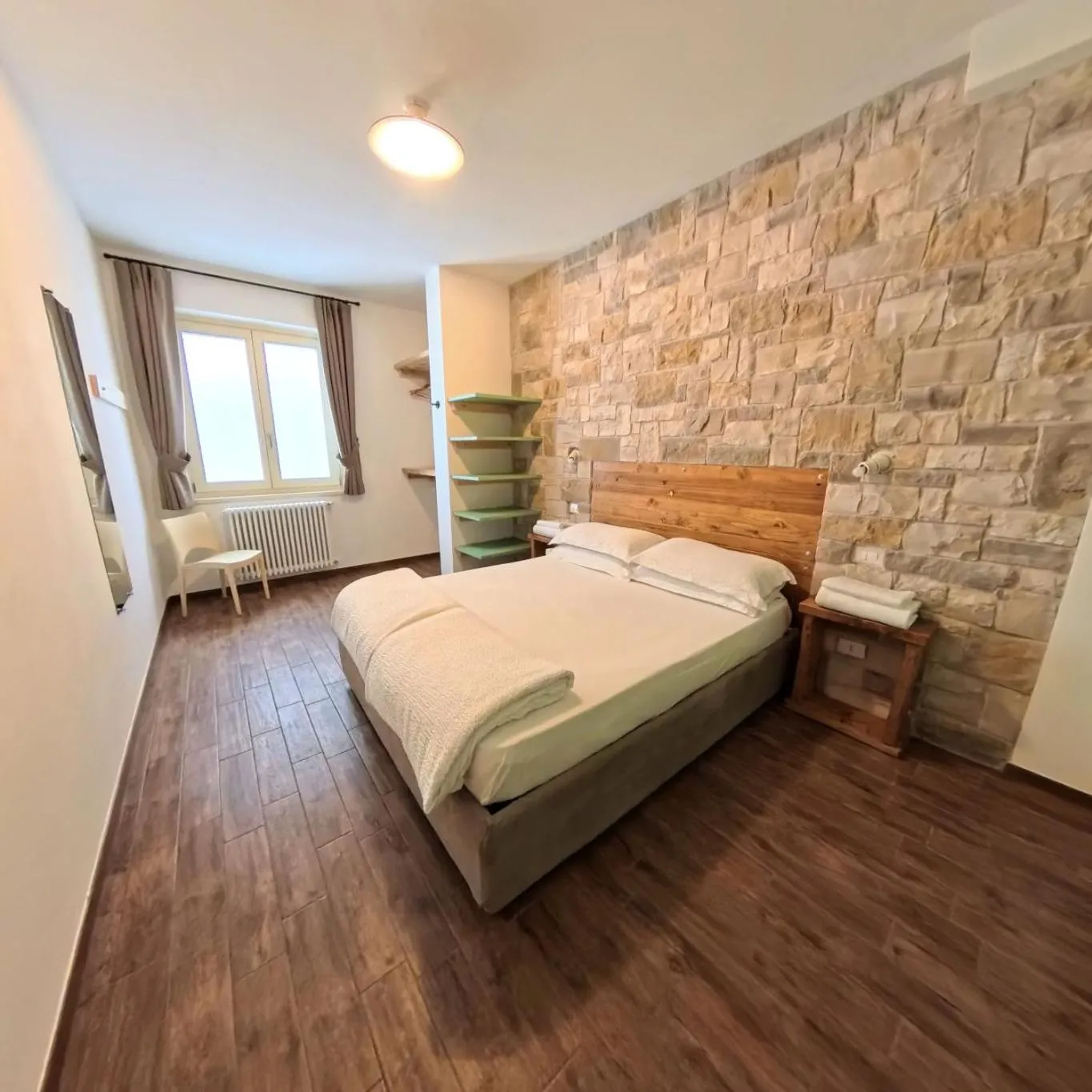 Bed in Oasi Da Vinci Apartments Lake Garda View